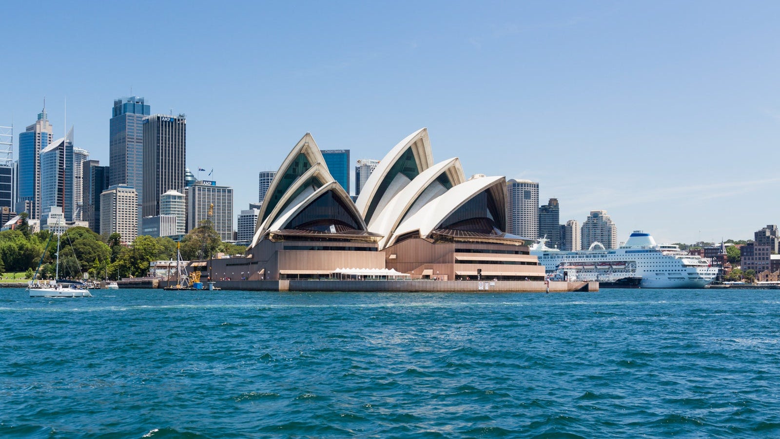 Central business district of Sydney and the Opera House with P&amp;O Pacific Pearl Cruise ship docked in the harbor, Australia