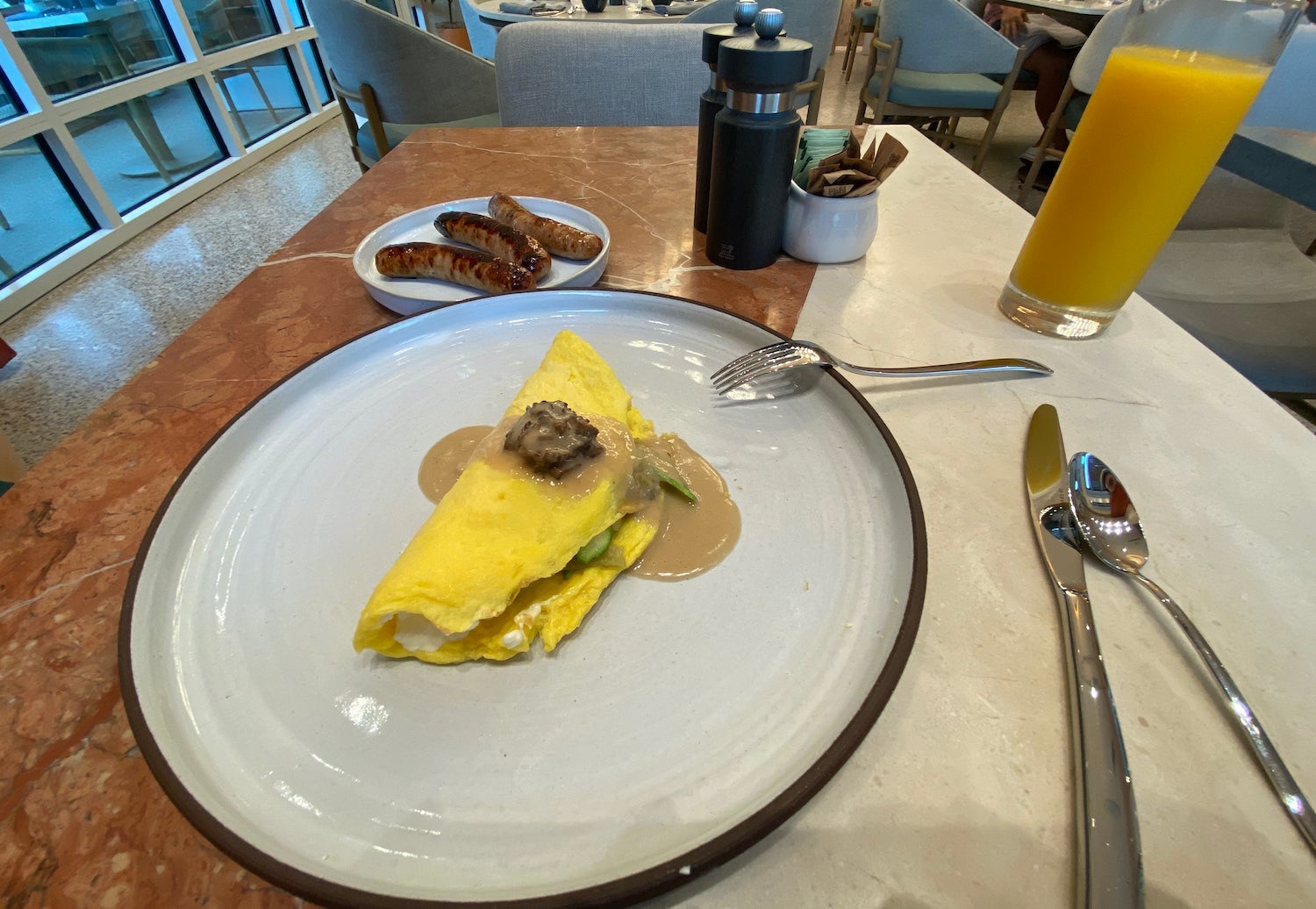 Veggie omelette with mushroom sauce and chicken sausage