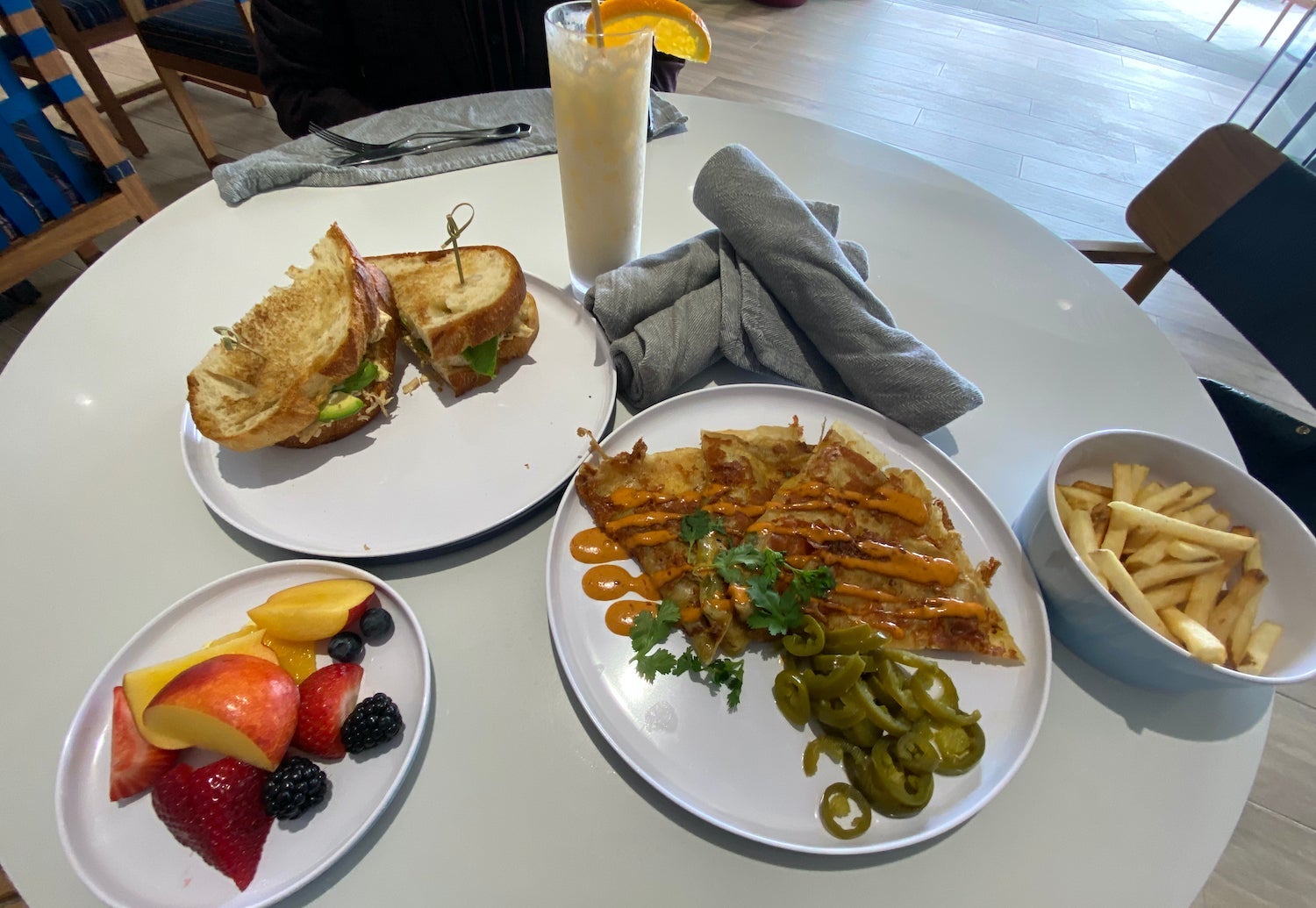 quesadillas, chicken sandwich and fruit plate