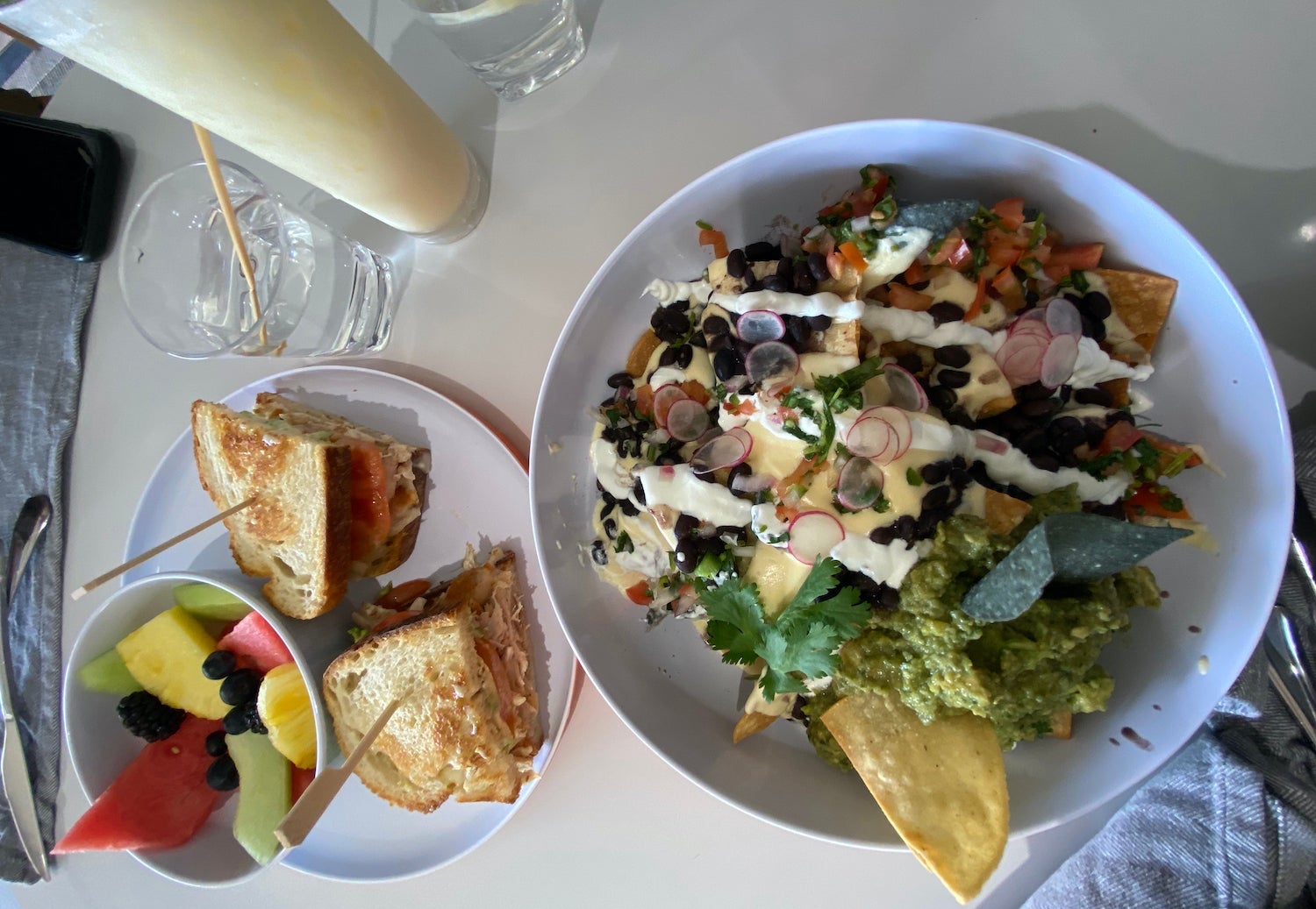 Nachos with a chicken sandwich