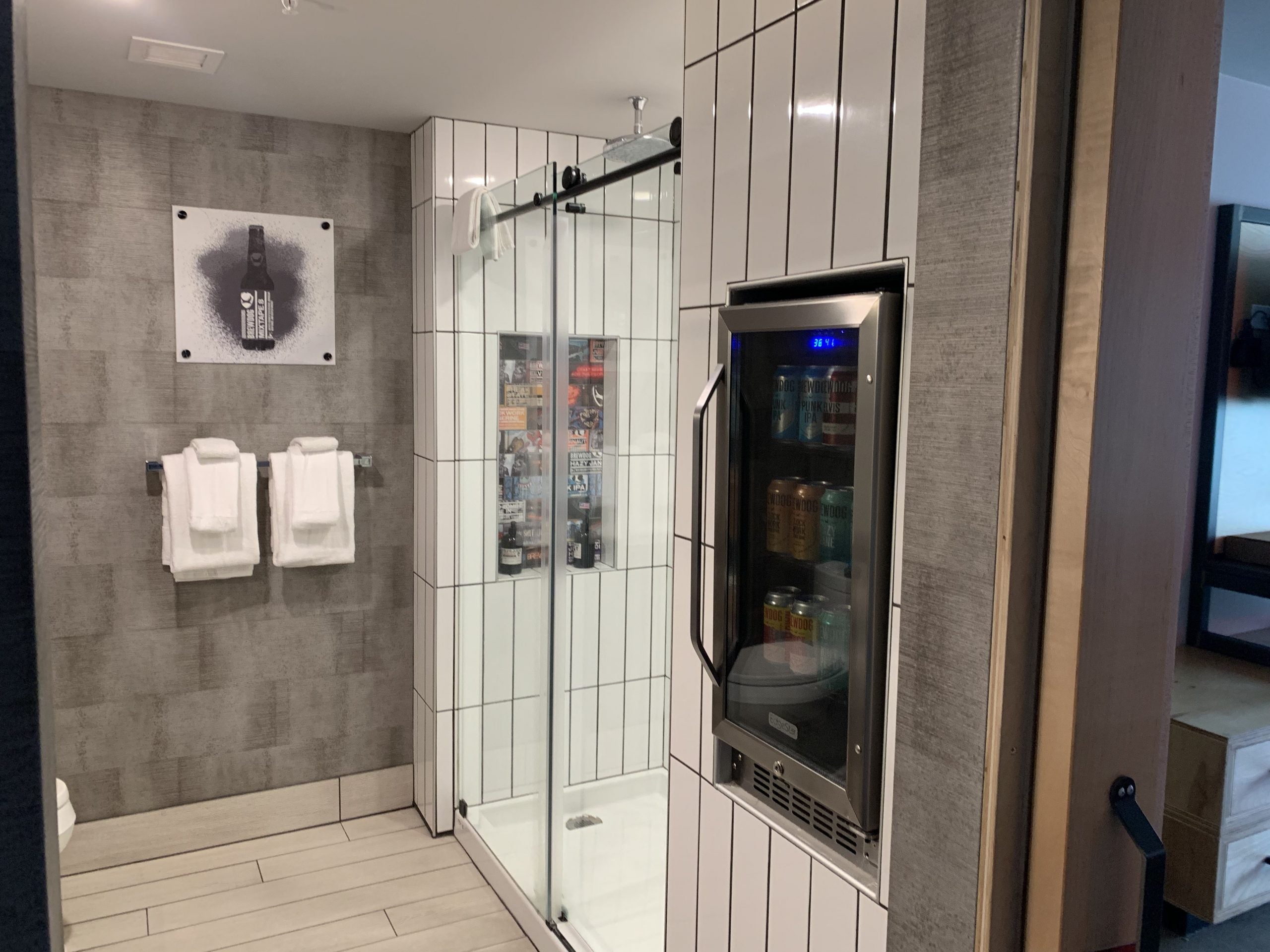 The bathroom and shower beer refrigerator at DogHouse.