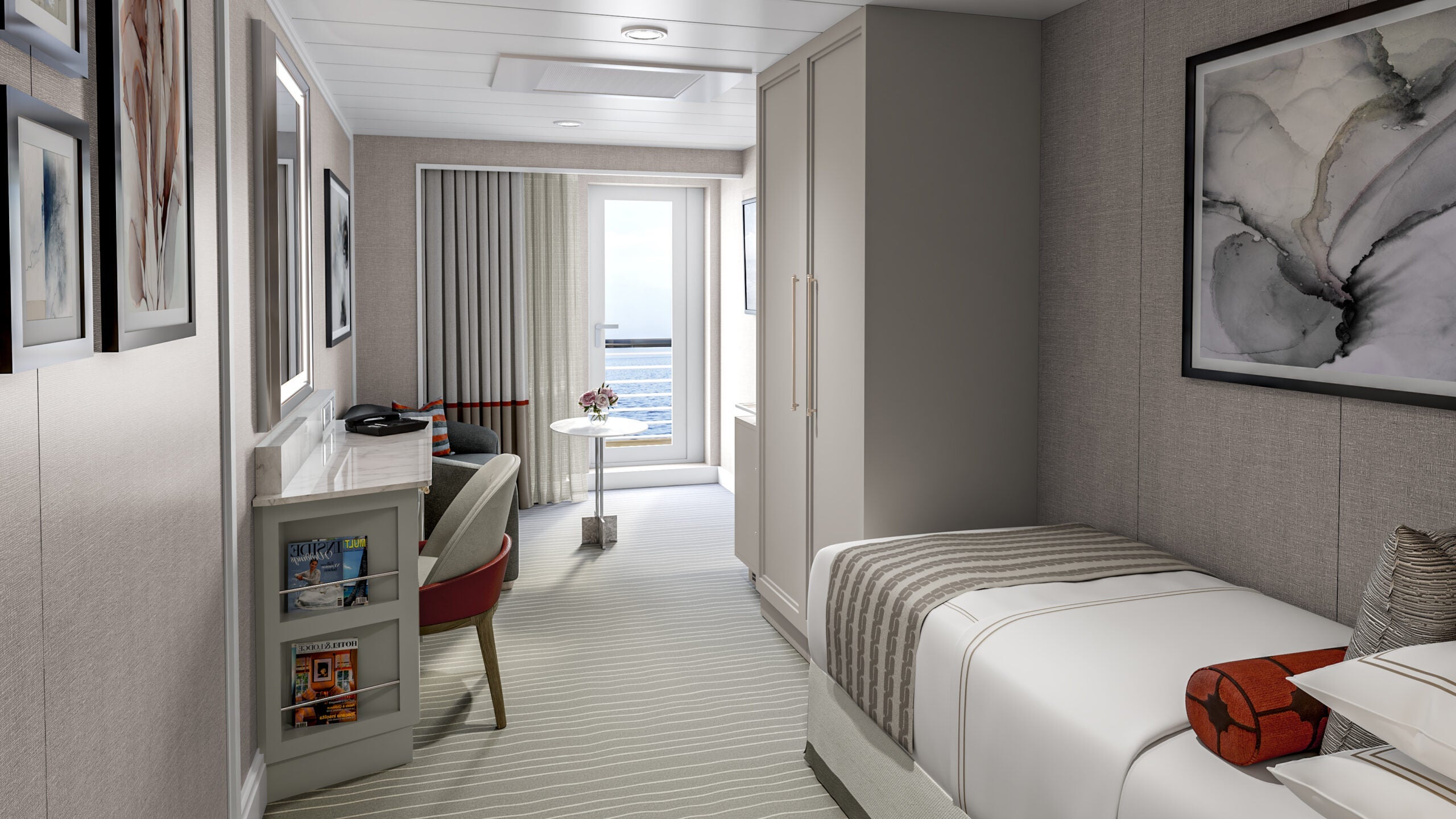 A cruise cabin with a single bed, a vanity and a balcony