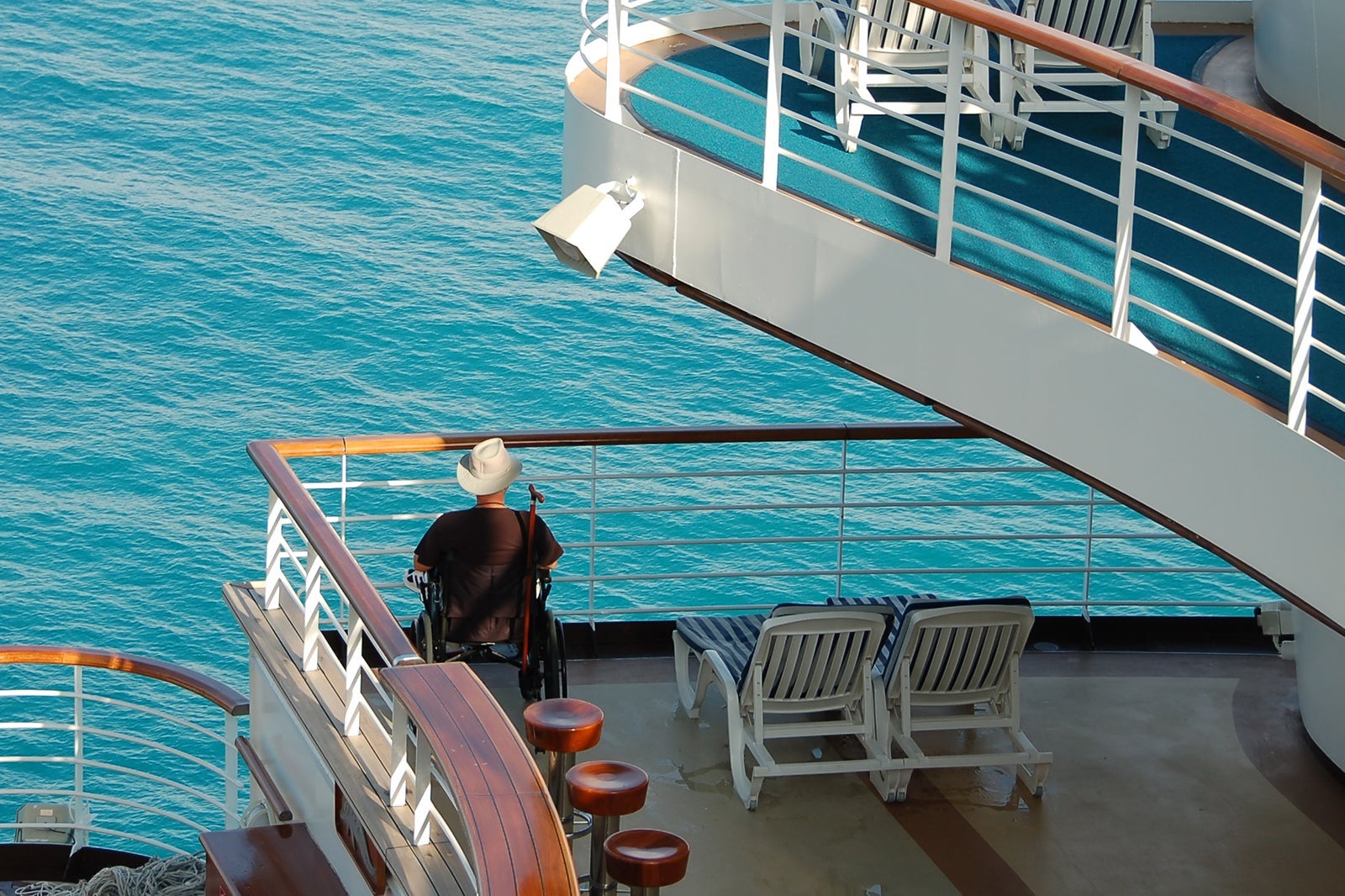Cruise passenger in wheelchair on cruise deck