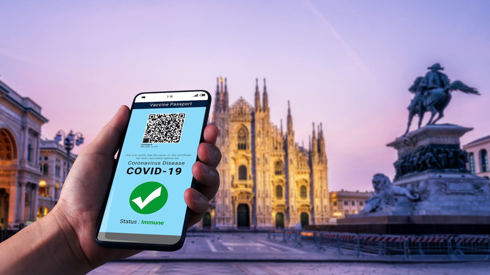 Traveler holds vaccine passport certificate to show COVID 19 vaccination status