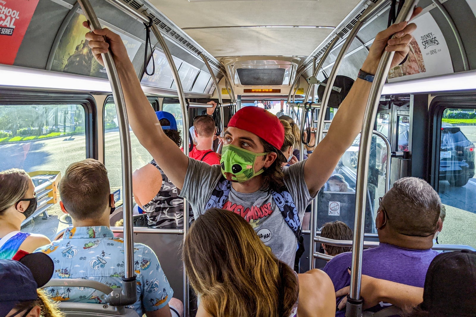 A Disney bus with standing room only