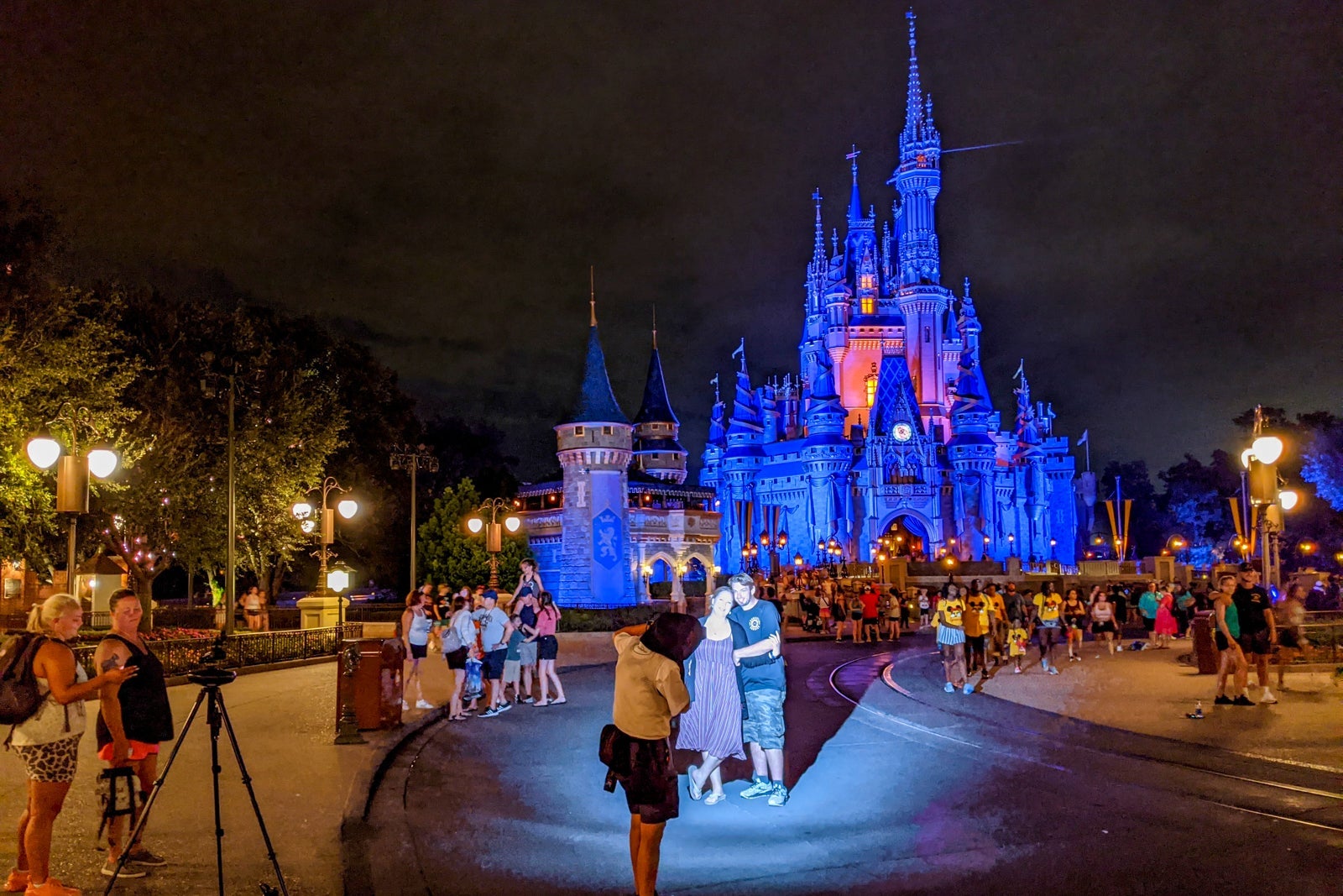 Guests getting final pictures after the Magic Kingdom closed for the night