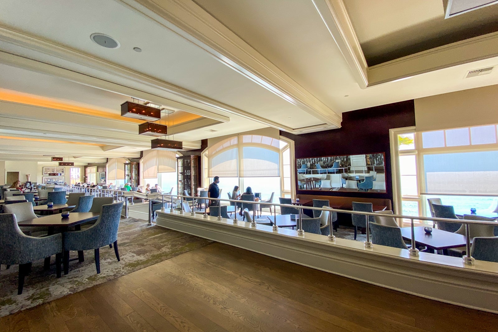 Hotel restaurant with large windows facing the ocean