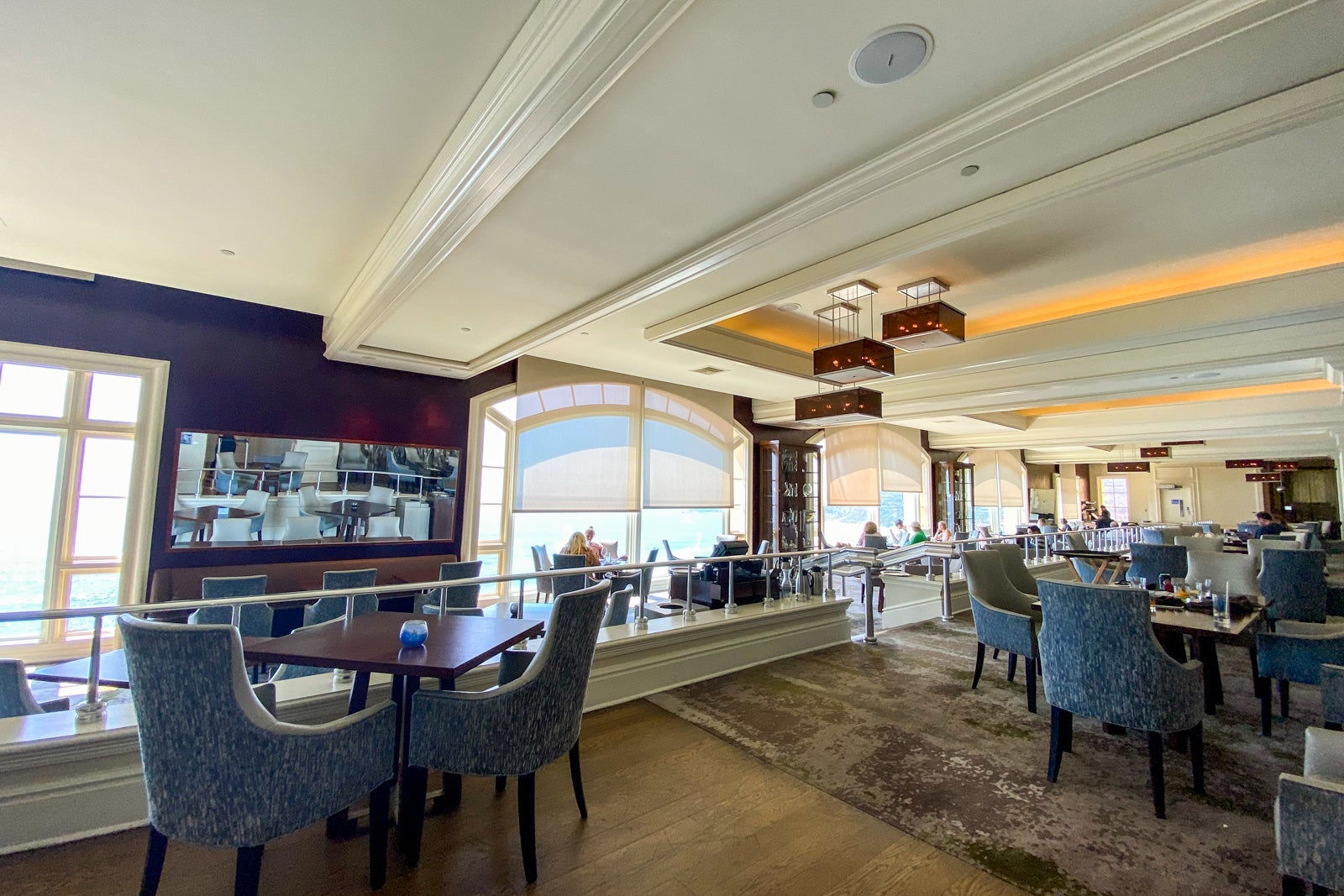 Hotel restaurant with large windows facing the ocean