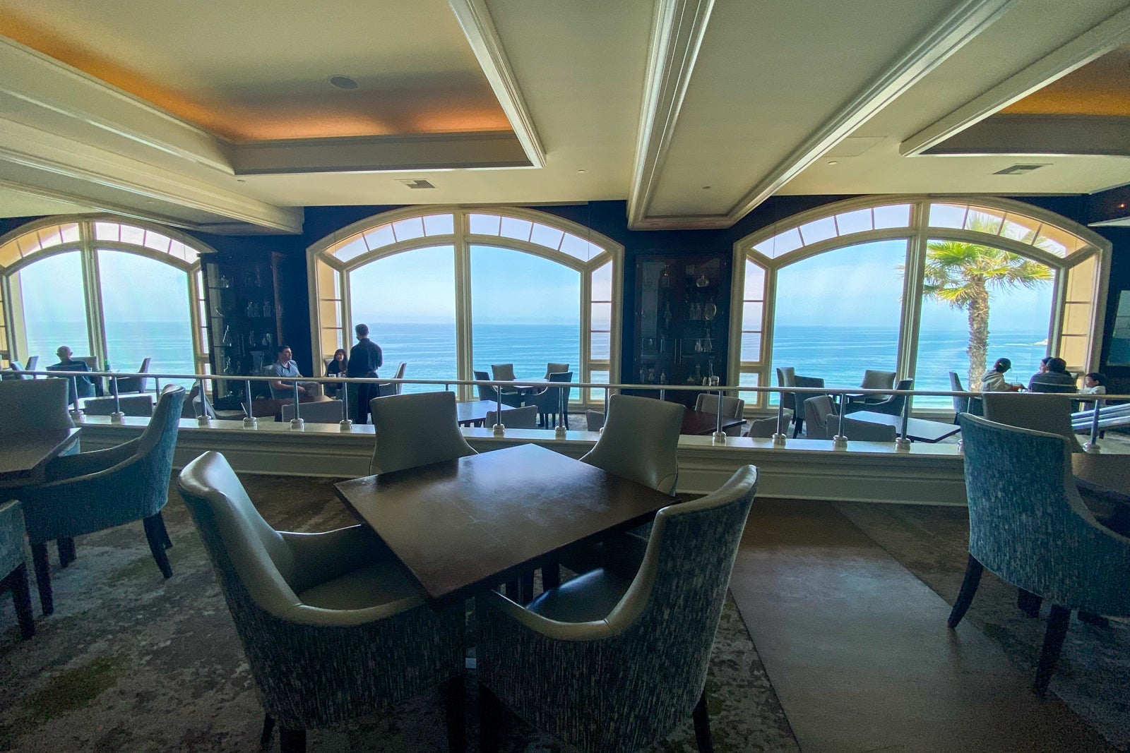 Hotel restaurant with large windows facing the ocean