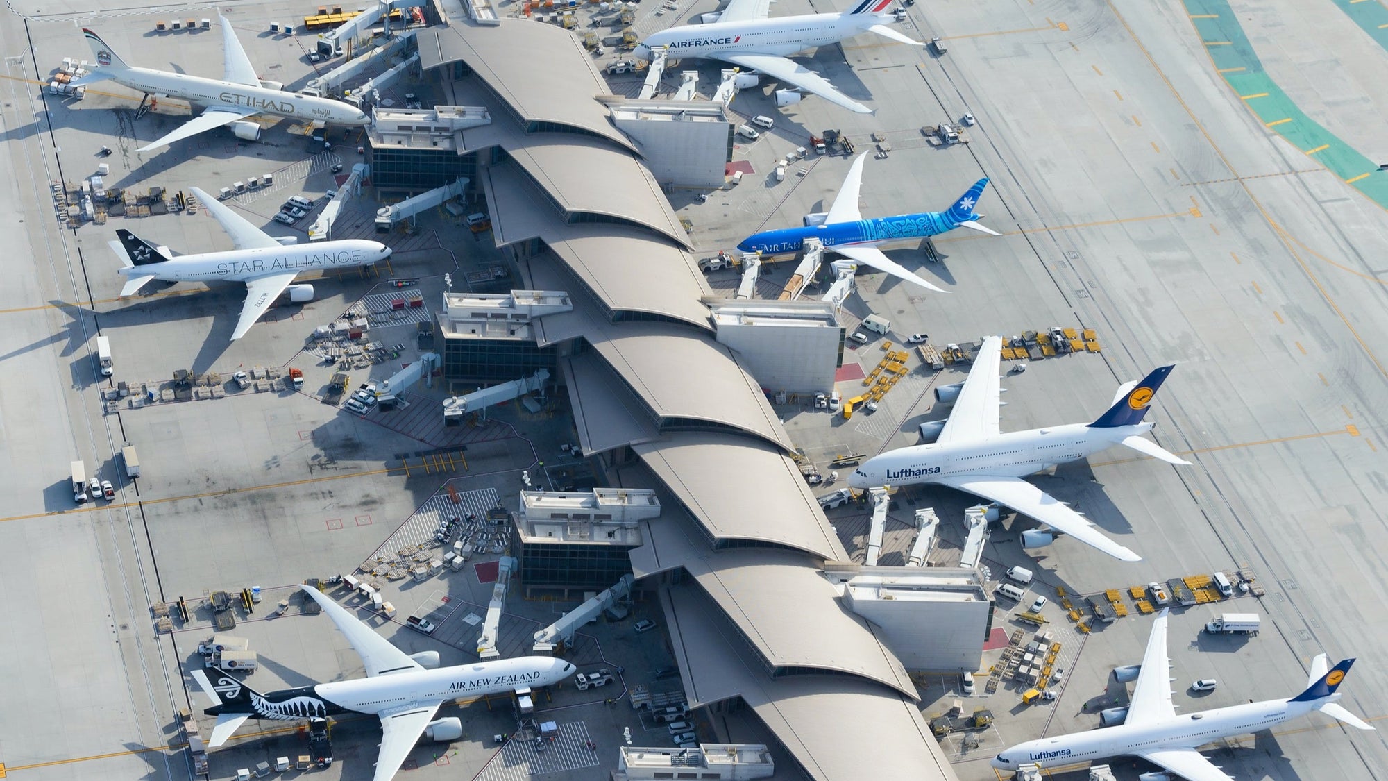 Aerial view of LAX airport with assorted planes