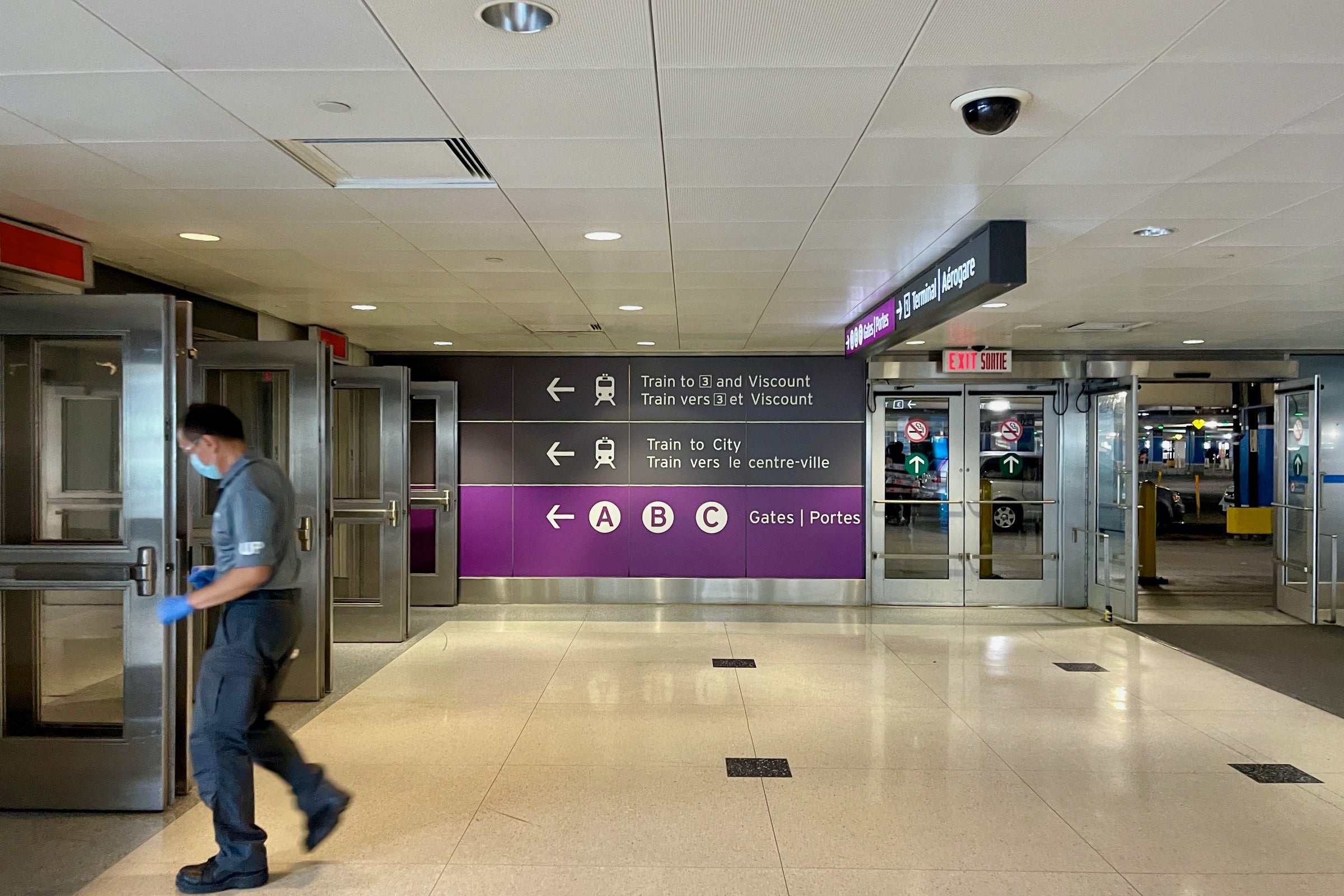 Sign pointing to UP Express train