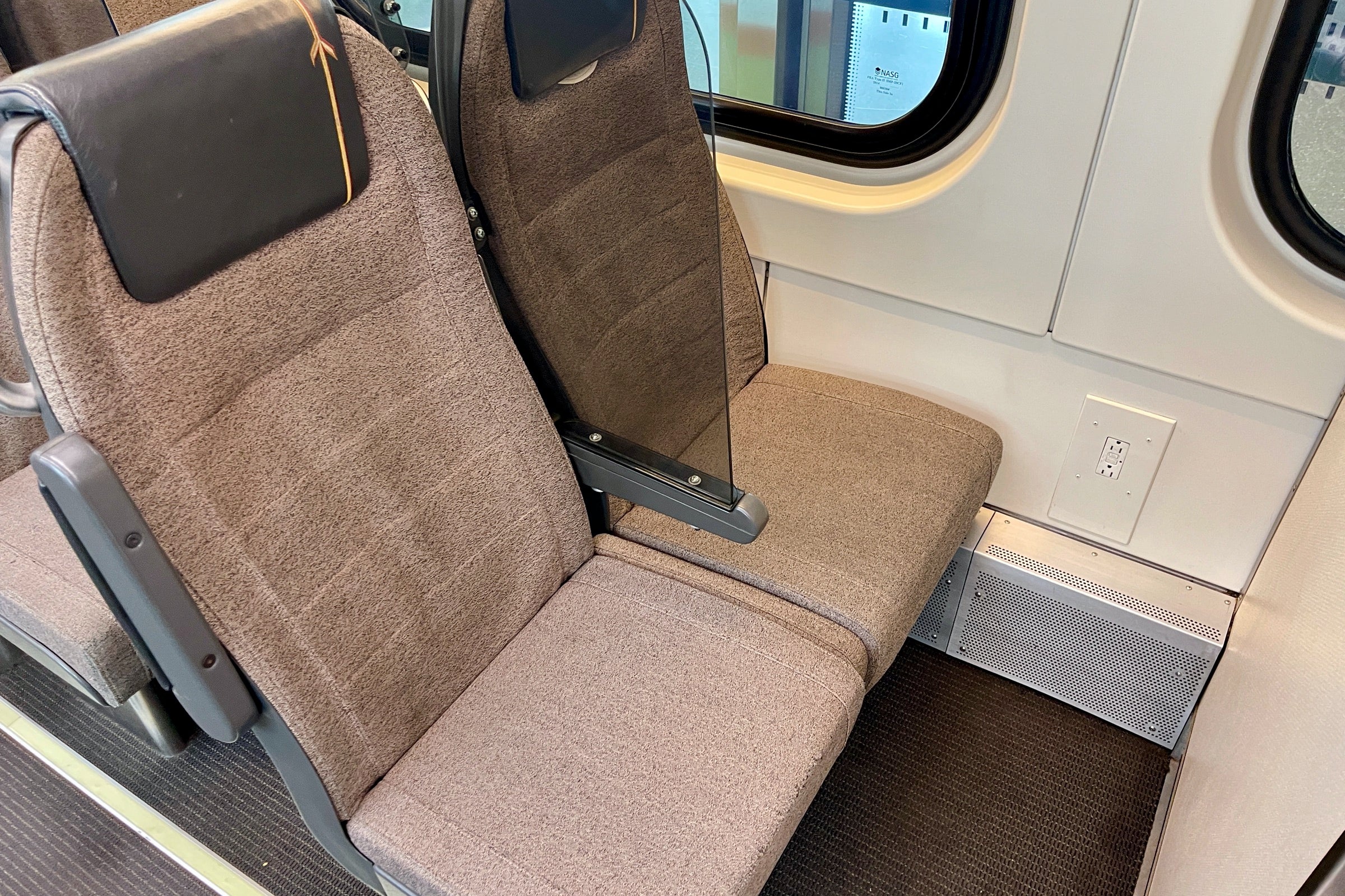 UP Express seats with plastic divider