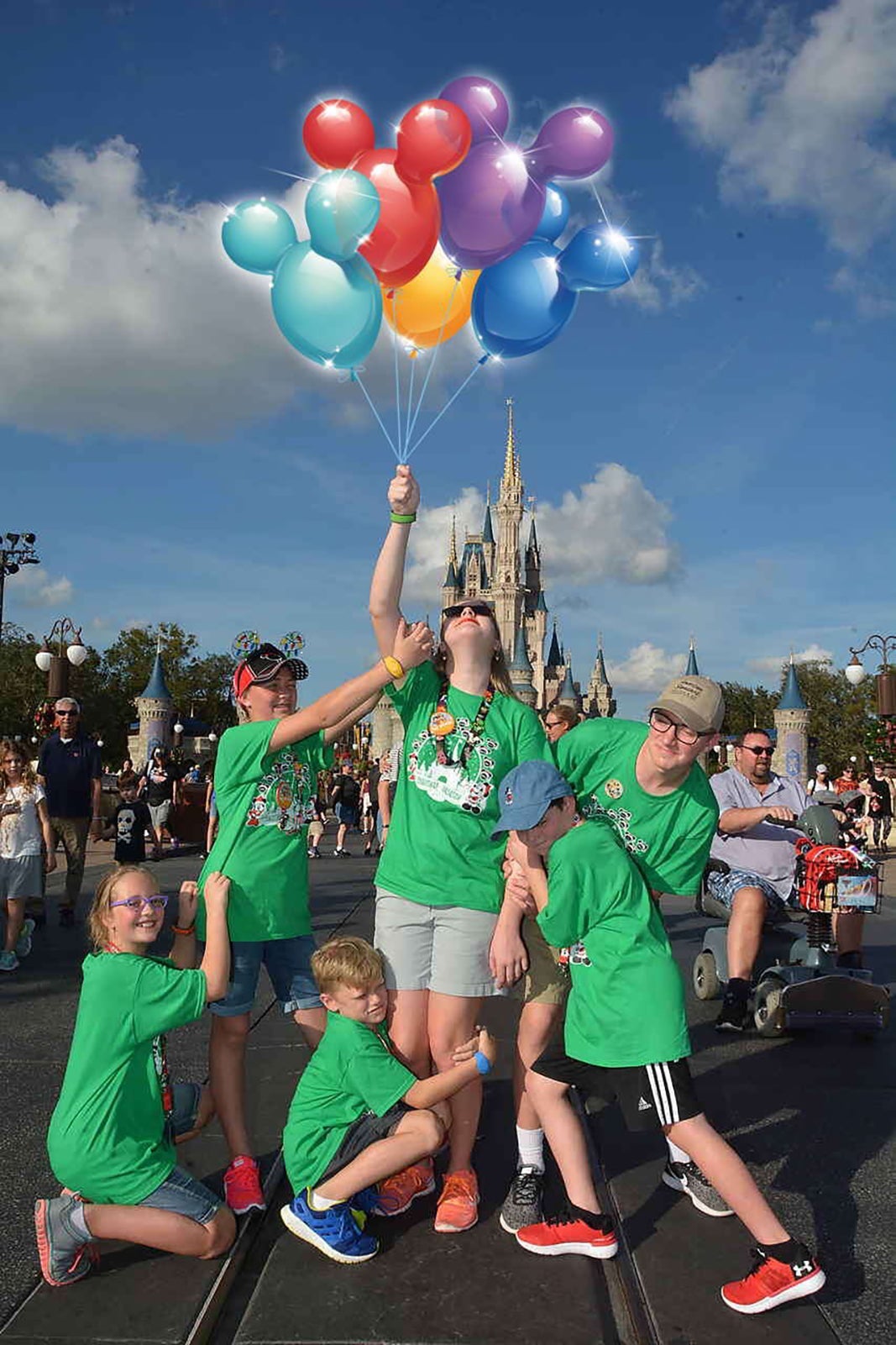 Family wearing matching Disney t-shirts