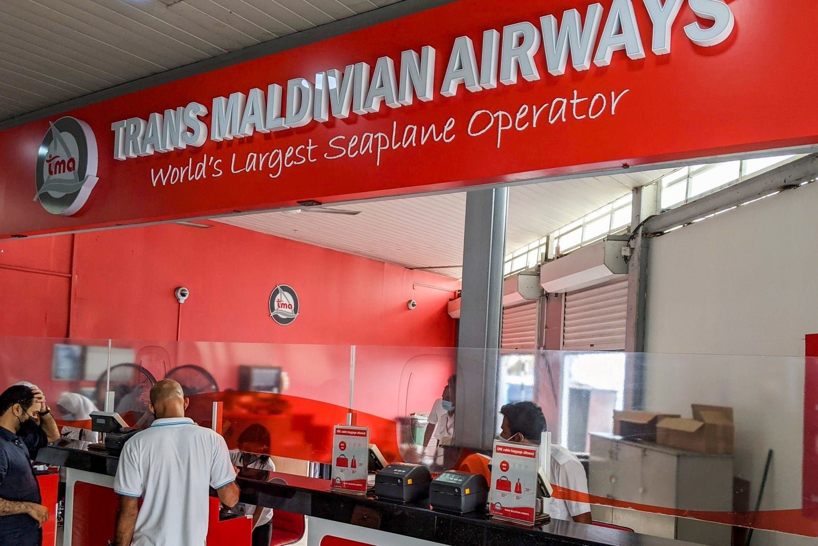 Check-in counter for Trans Maldivian Airways flight