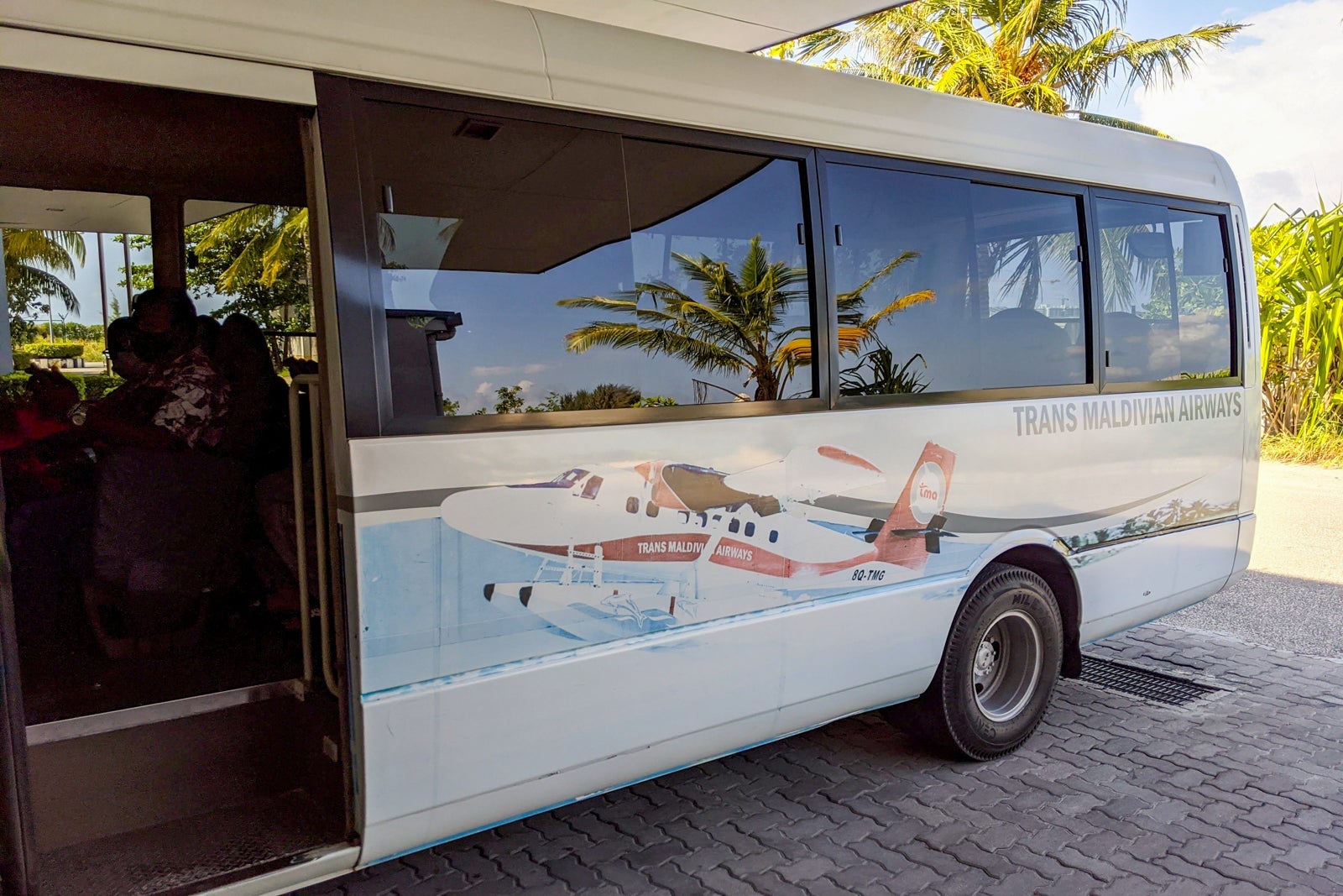 Trans Maldivian Airways bus between seaplane terminal and international arrivals area