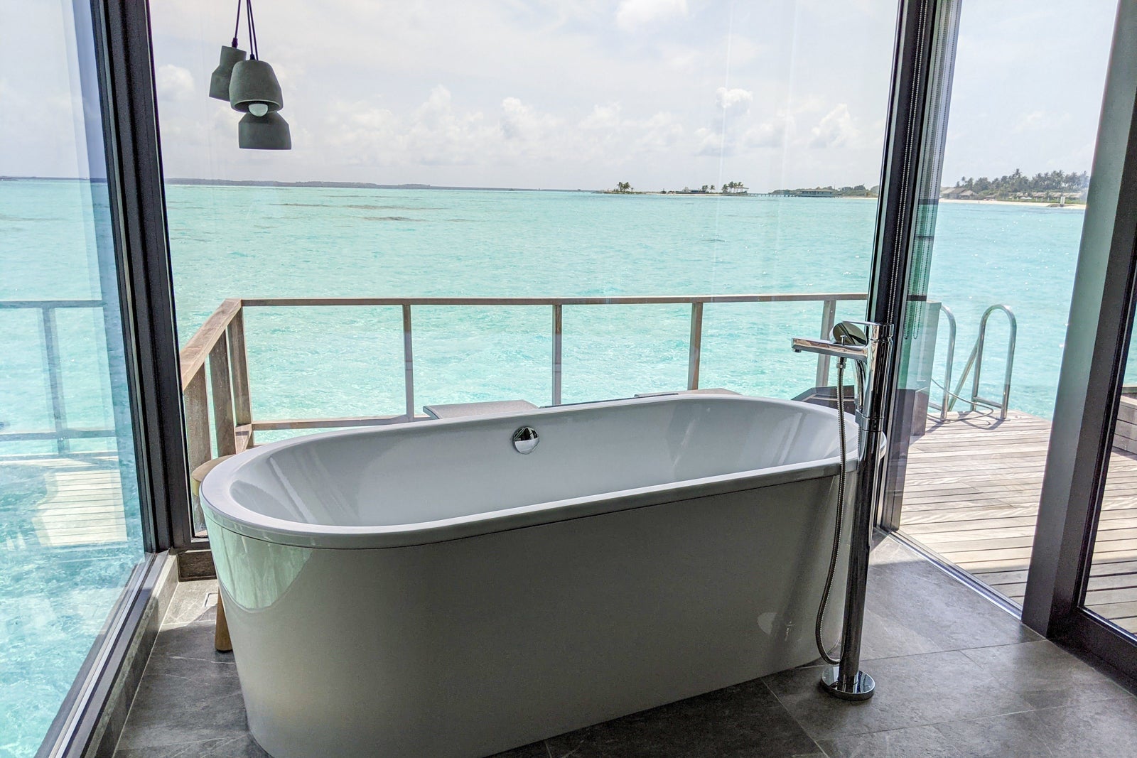 Bathtub in sunrise overwater villa at the Le Meridien Maldives