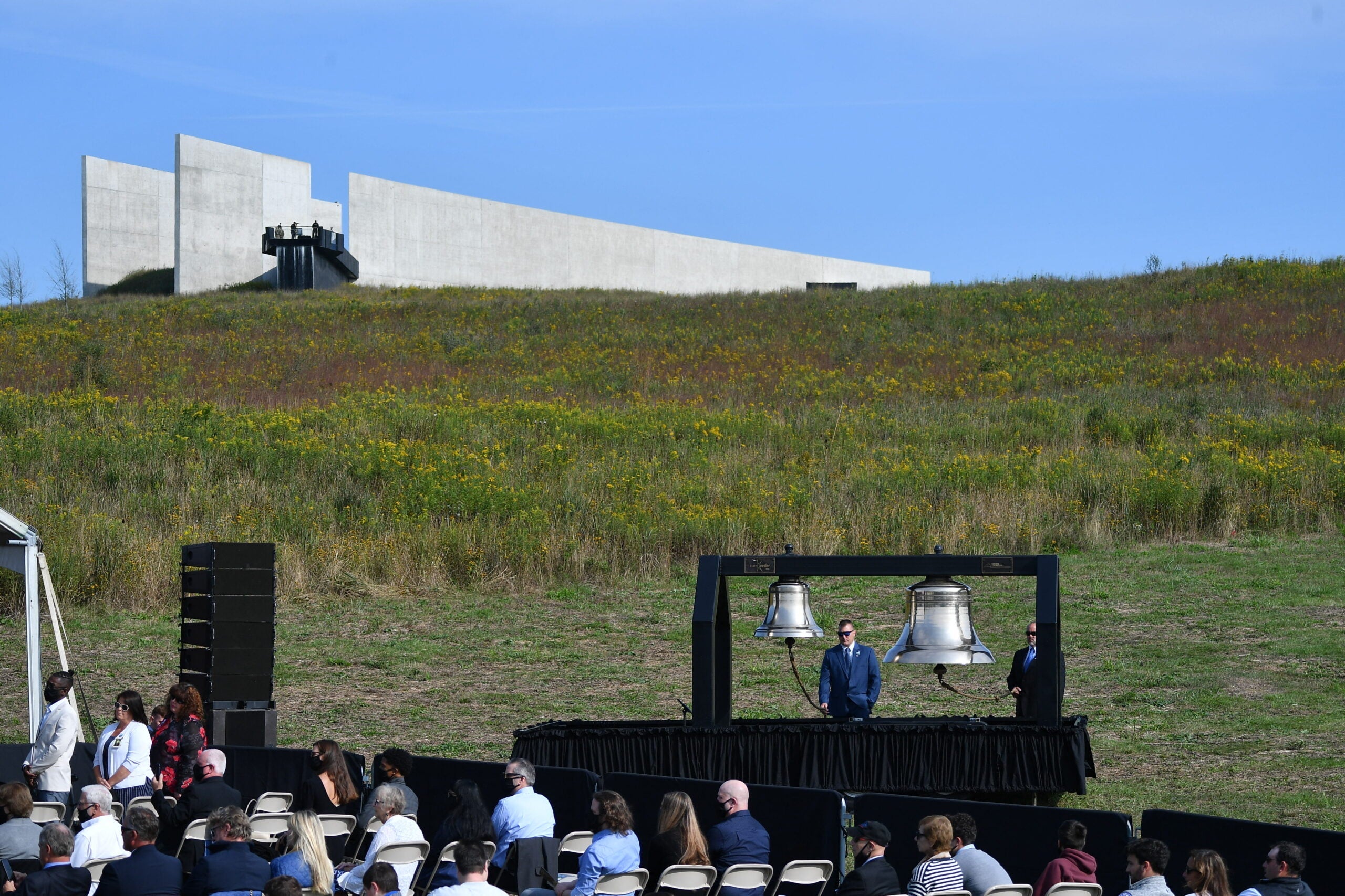 A "ring of bells" takes place during a 9/11 commemoration at the Flight 93 National Memorial in Shanksville, Pennsylvania on September 11, 2021. - America marked the 20th anniversary of 9/11 Saturday with solemn ceremonies given added poignancy by the recent chaotic withdrawal of troops from Afghanistan and return to power of the Taliban. (Photo by MANDEL NGAN / AFP) (Photo by MANDEL NGAN/AFP via Getty Images)