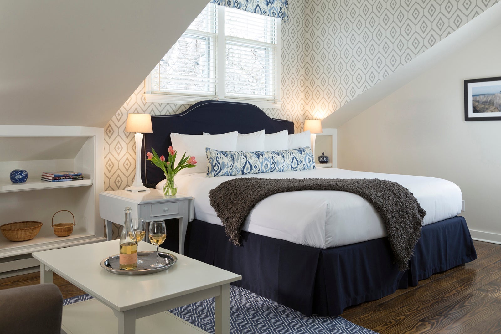 flowers and wine in bedroom