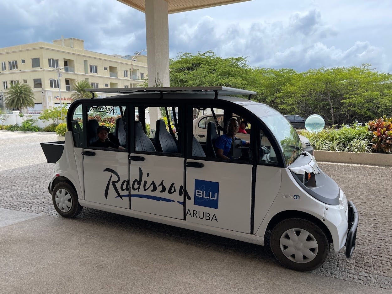 Beach transfer golf cart at Radisson Blu Aruba