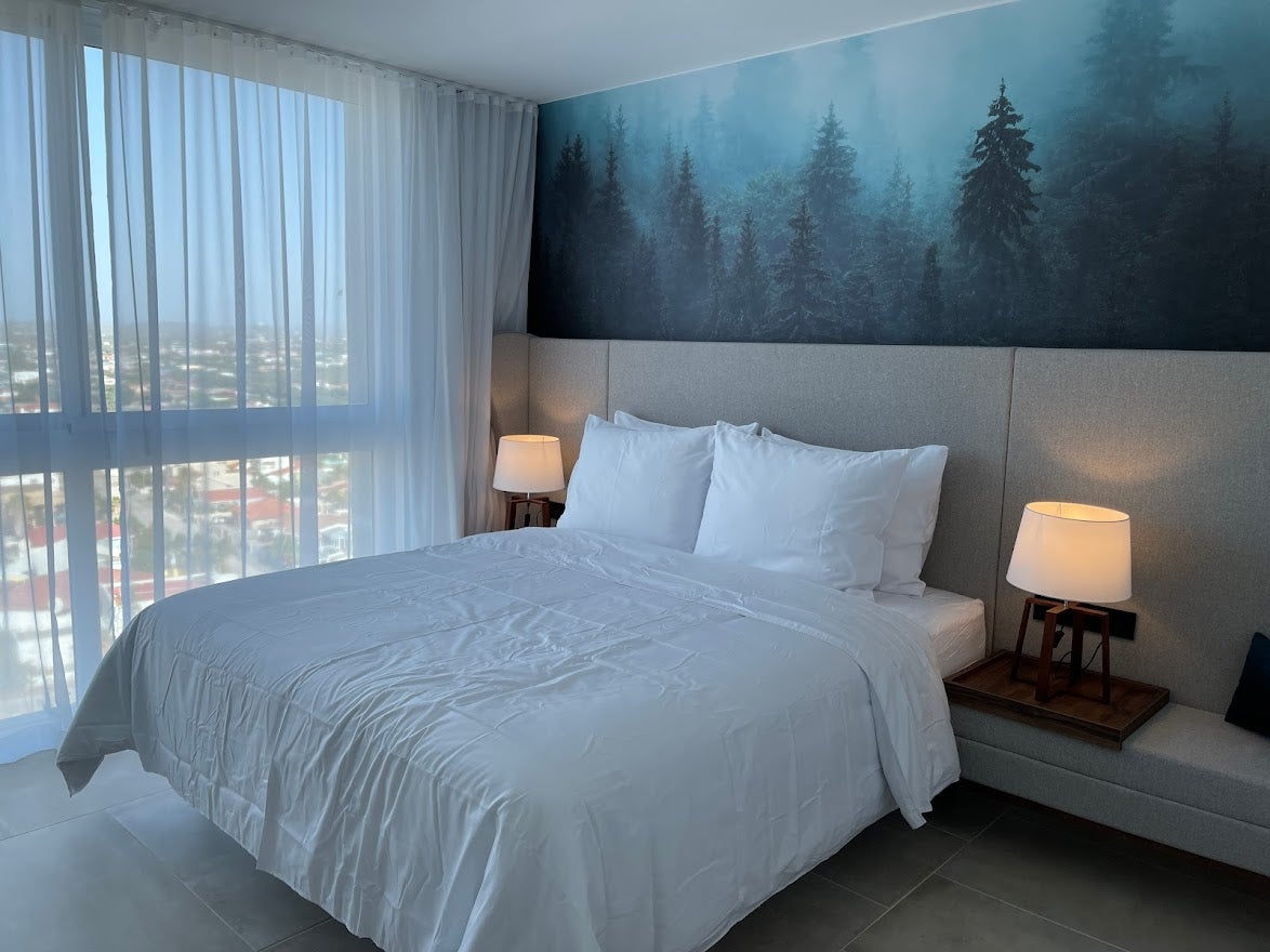 Bed in a Room at Radisson Blu Aruba