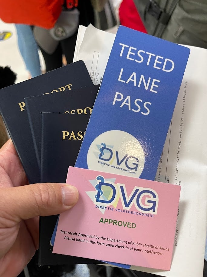 Passport with COVID testing clearance cards
