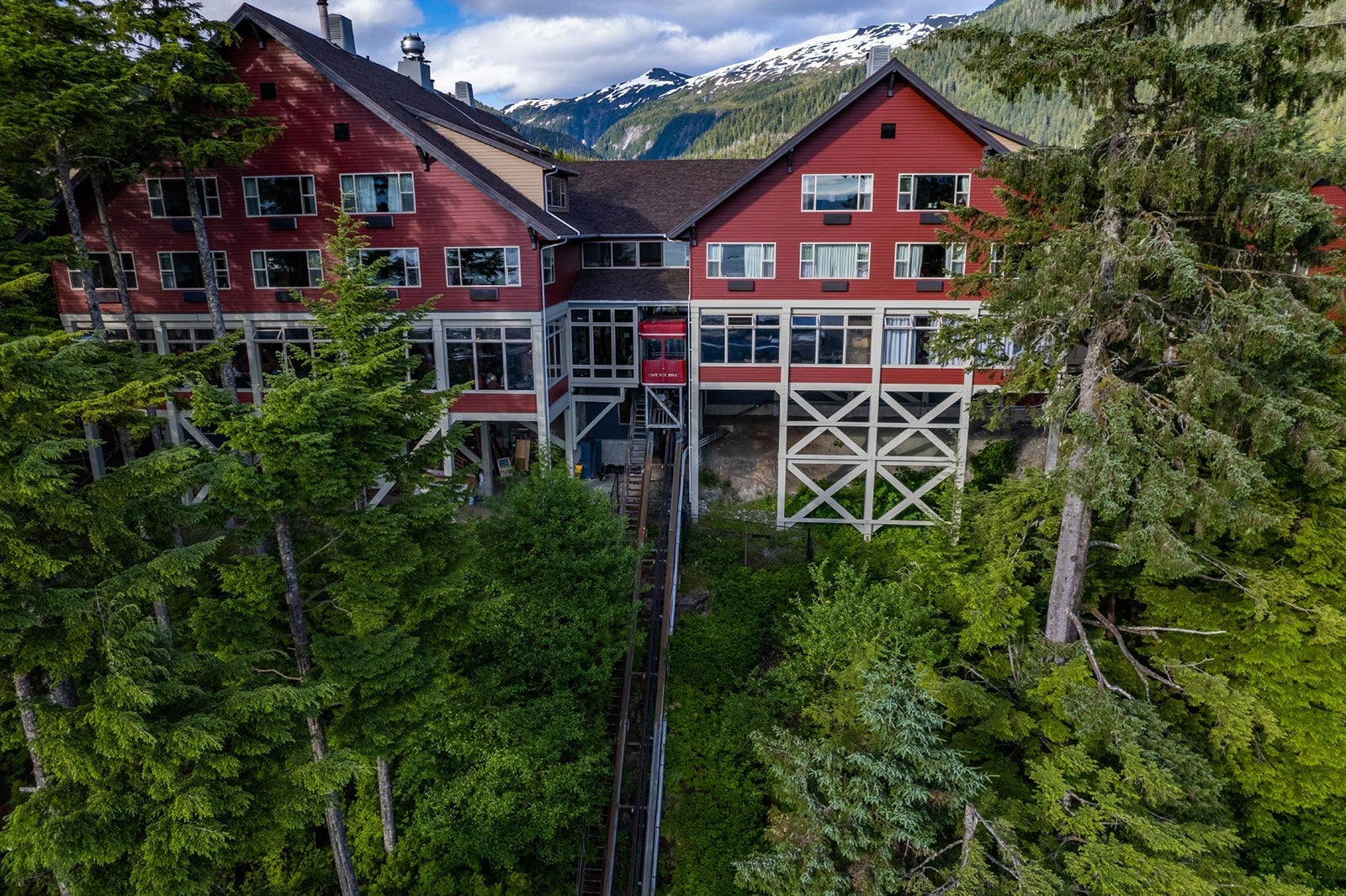 Cape Fox Lodge exterior with trees