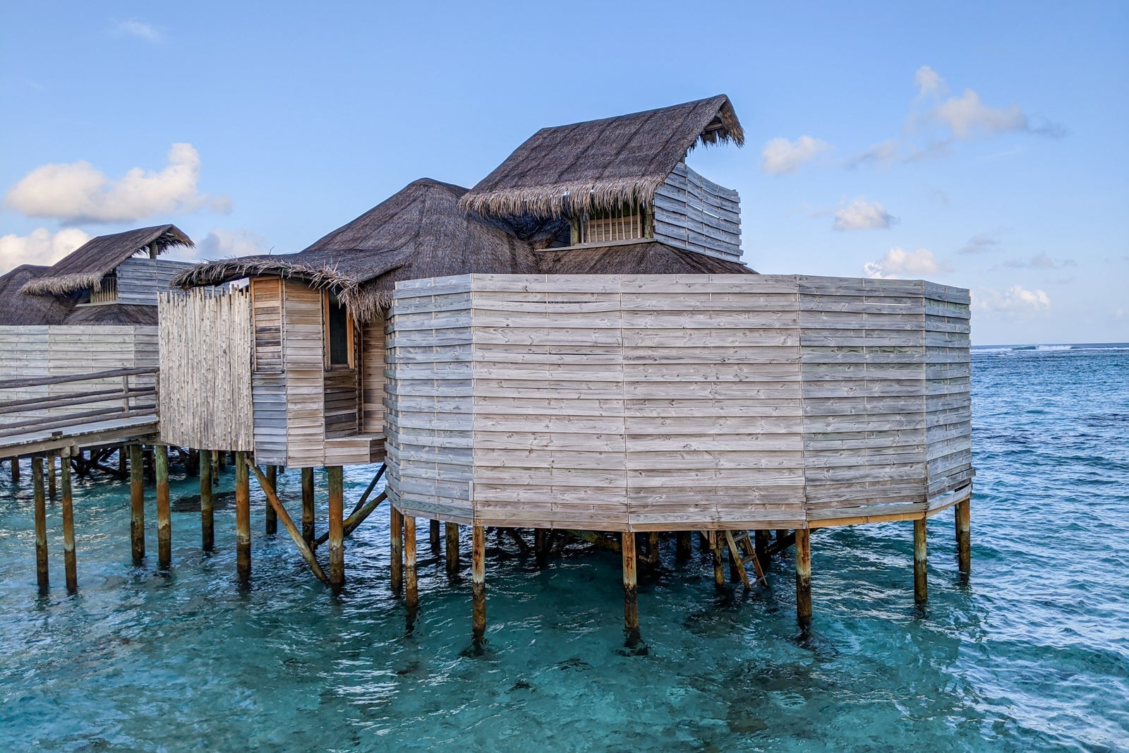 Privacy walls surround part of water villas
