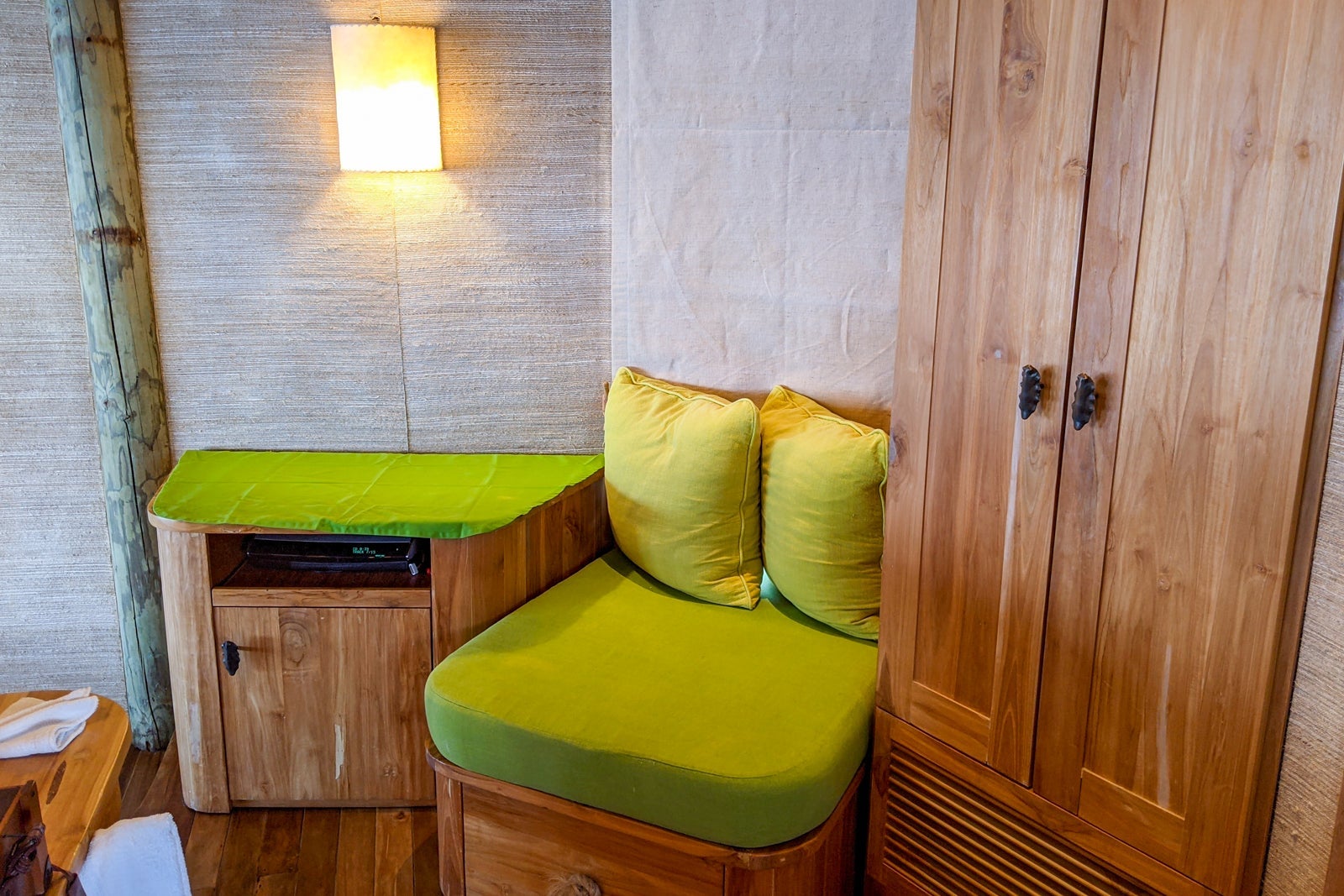 Sitting area next to a closet