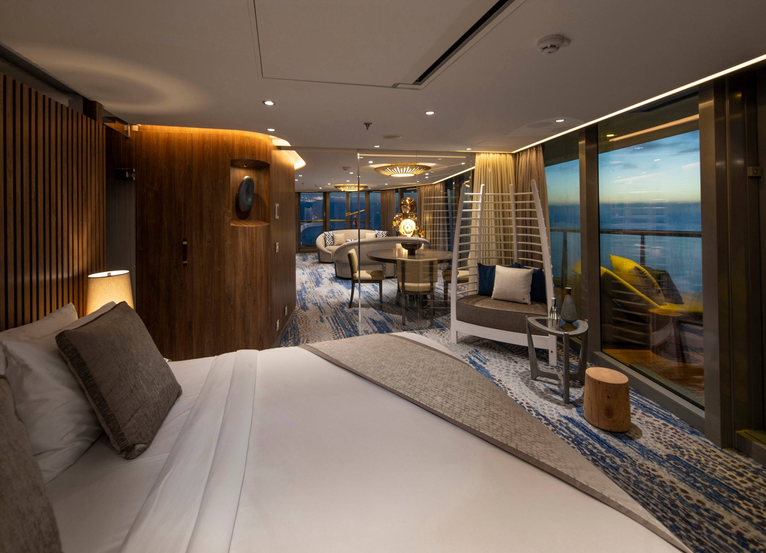 The bedroom of a Penthouse Suite on Celebrity Flora.