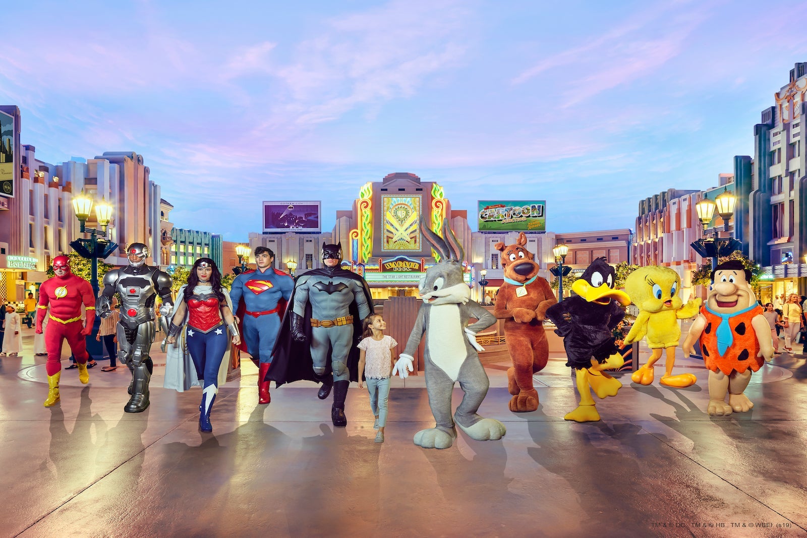 child walking with Warner Brother characters