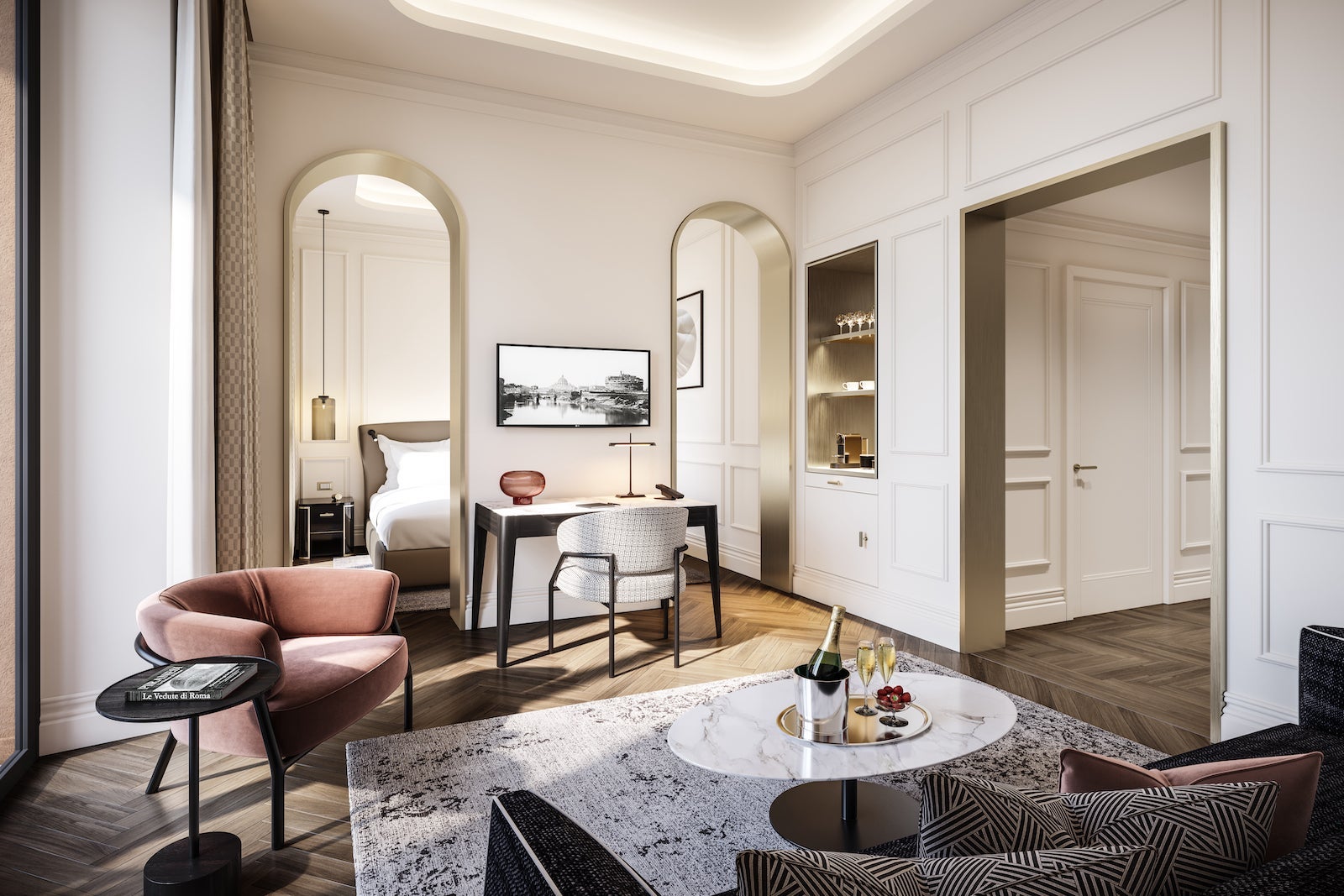 Large hotel room with windows, chairs, table and white walls