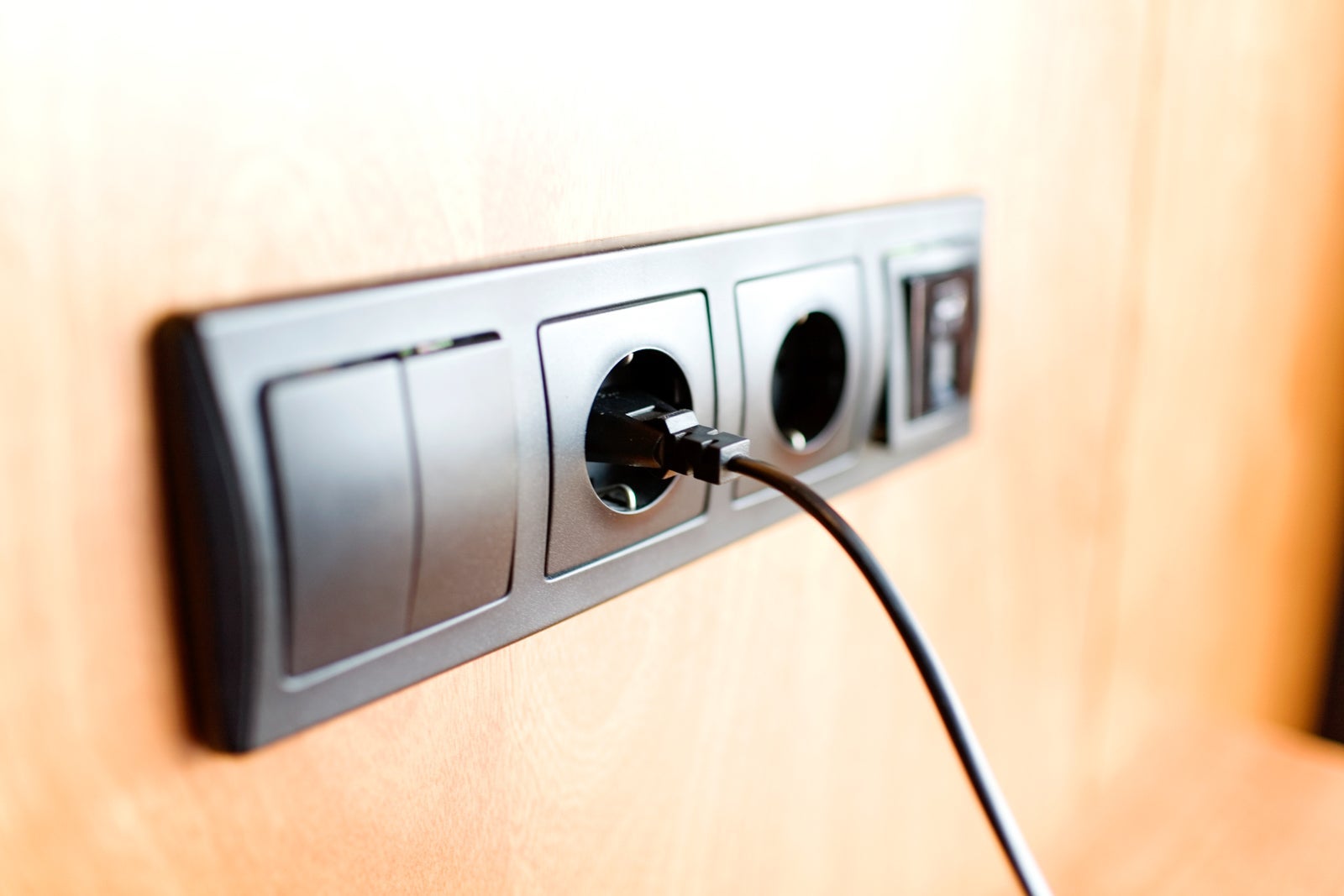 Electrical outlets with cord plugged in