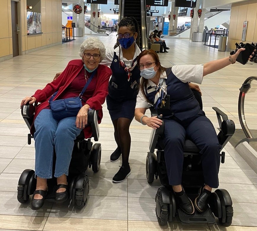 Passenger using Will mobility device at Tampa International Airport. 