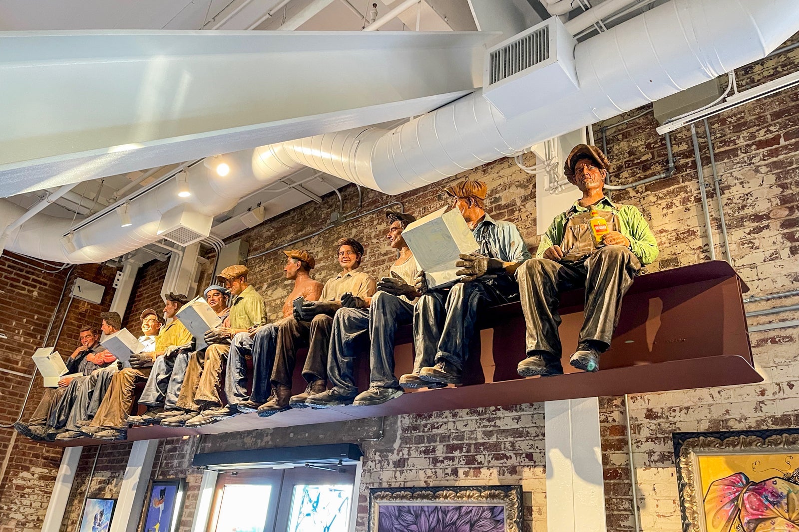 Sculpture depicting the men that worked at Savannah's power plant at the JW Marriott Savannah Plant Riverside