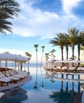 The sun sets over the pool at the Hilton Los Cabos