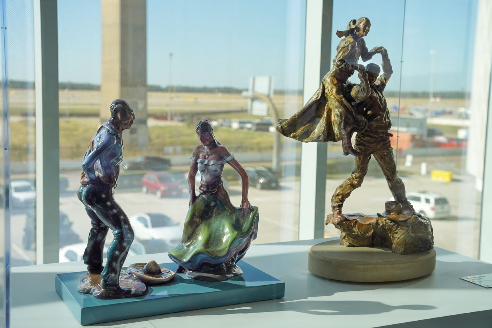 Fiesta Dancers by Latino artist Luis Jimenez along side High Flying by Larry Schuekler