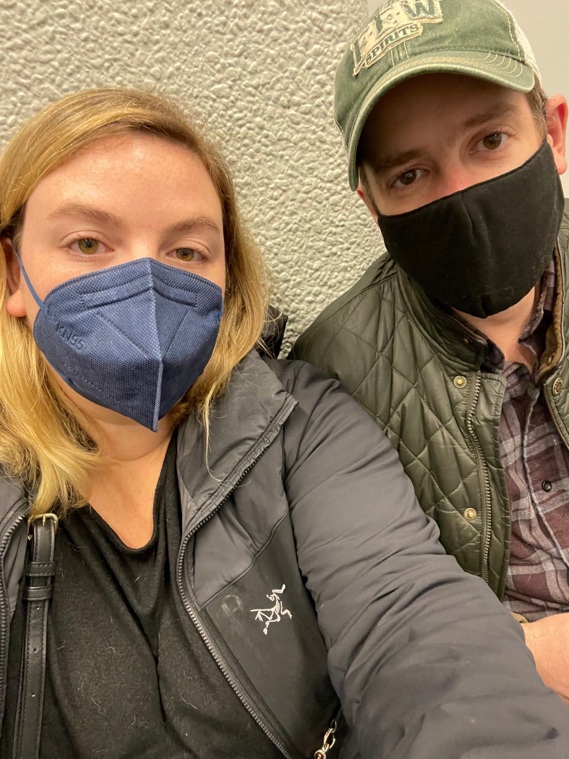 Ali Wunderman and her husband take a masked selfie while waiting for her testing appointment at SFO.