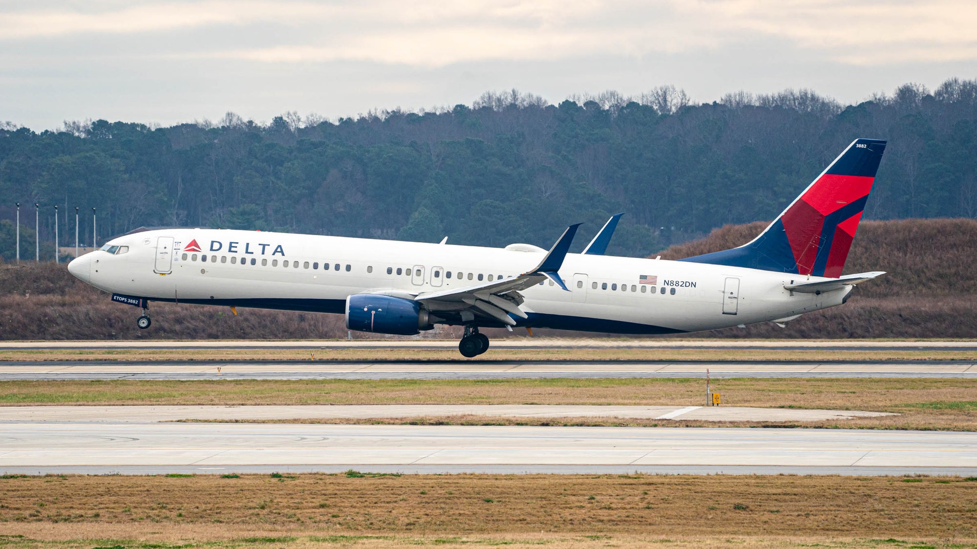 Delta Boeing 737-900 ATL Cloudy Landing TPGStock-1