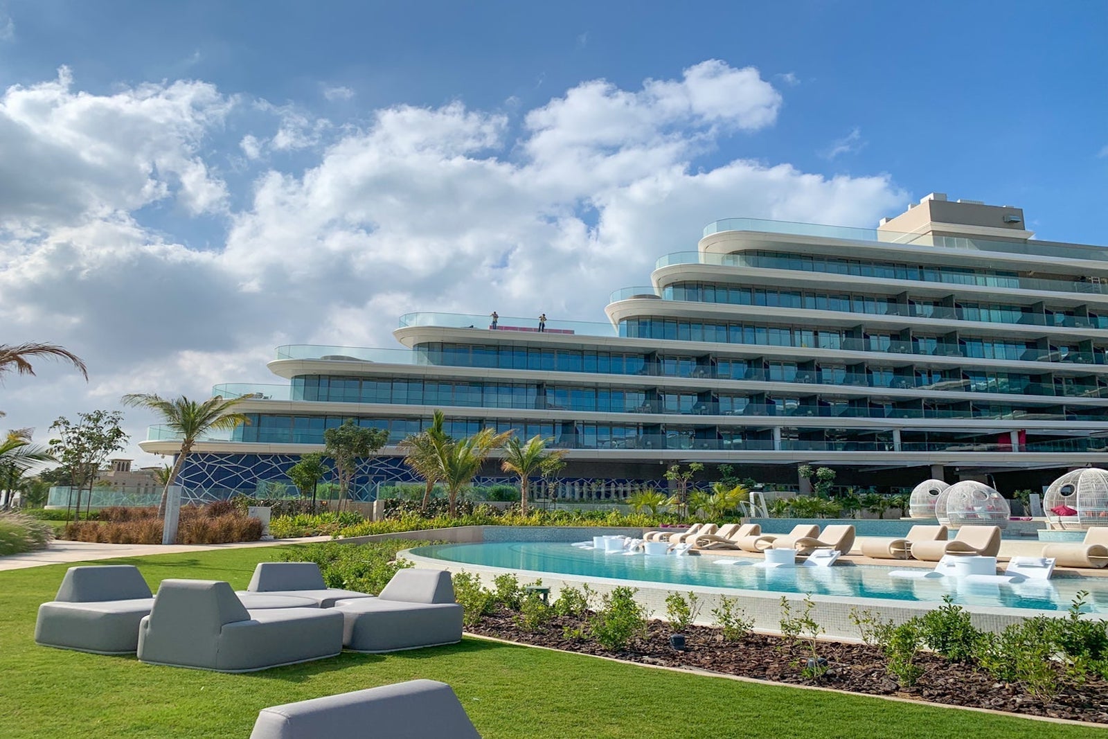 exterior shot of hotel with pool