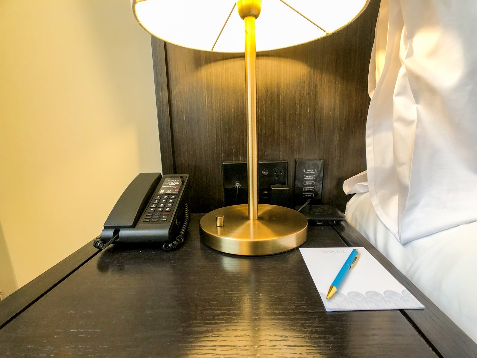 Hotel room table with phone.