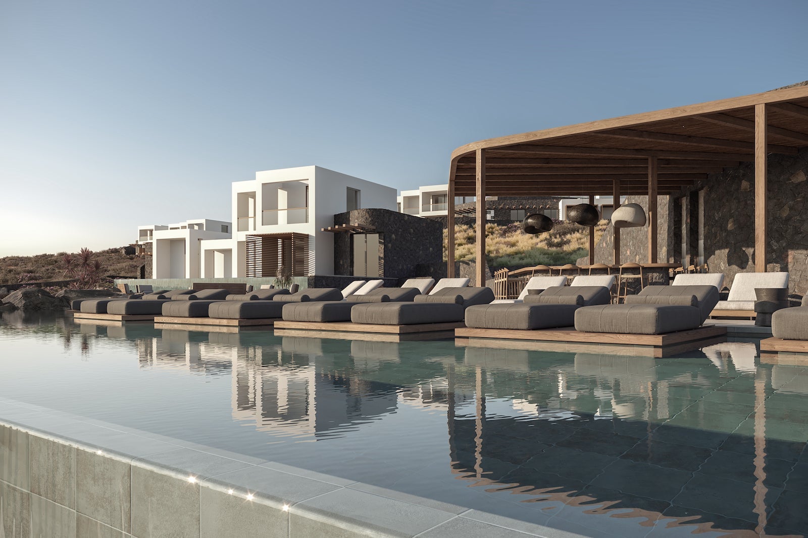 infinity pool with lounge chairs