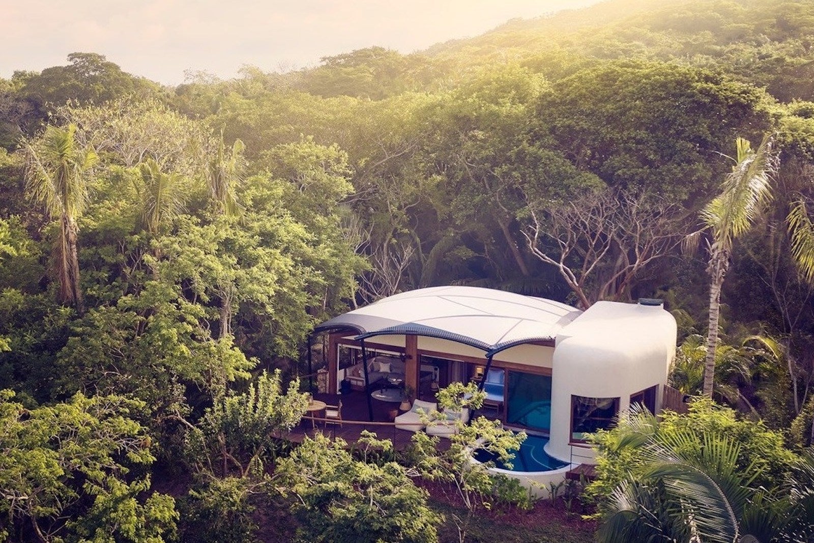 rendering of tent with pool in jungle of Mexico