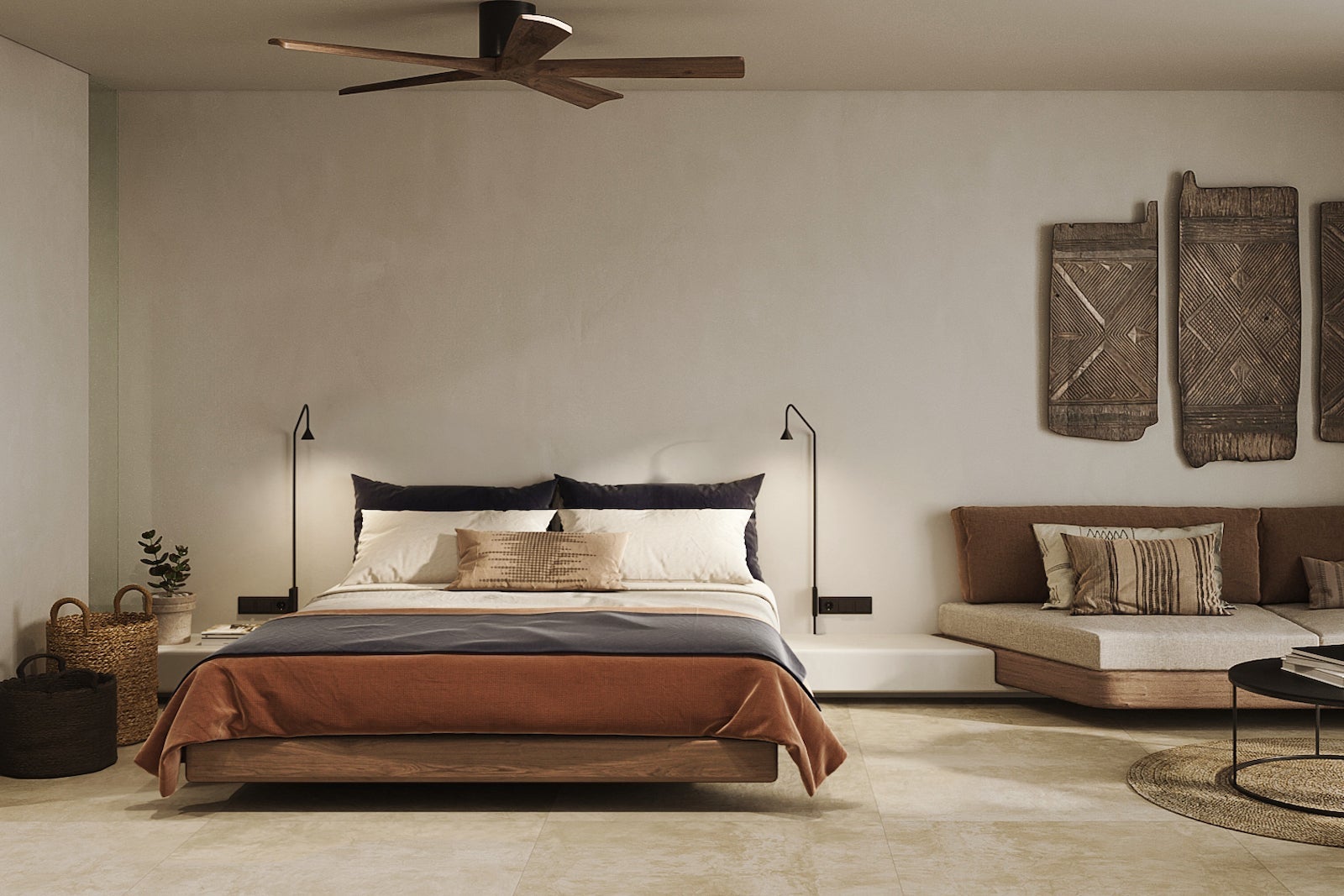 bohemian-style hotel room with bed, couch and ceiling fan