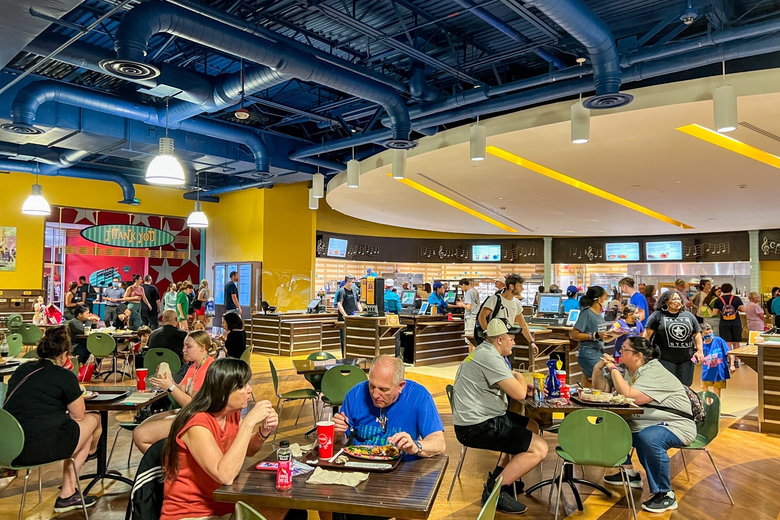Guests eating in food court at Disney's All-Star Music Resort