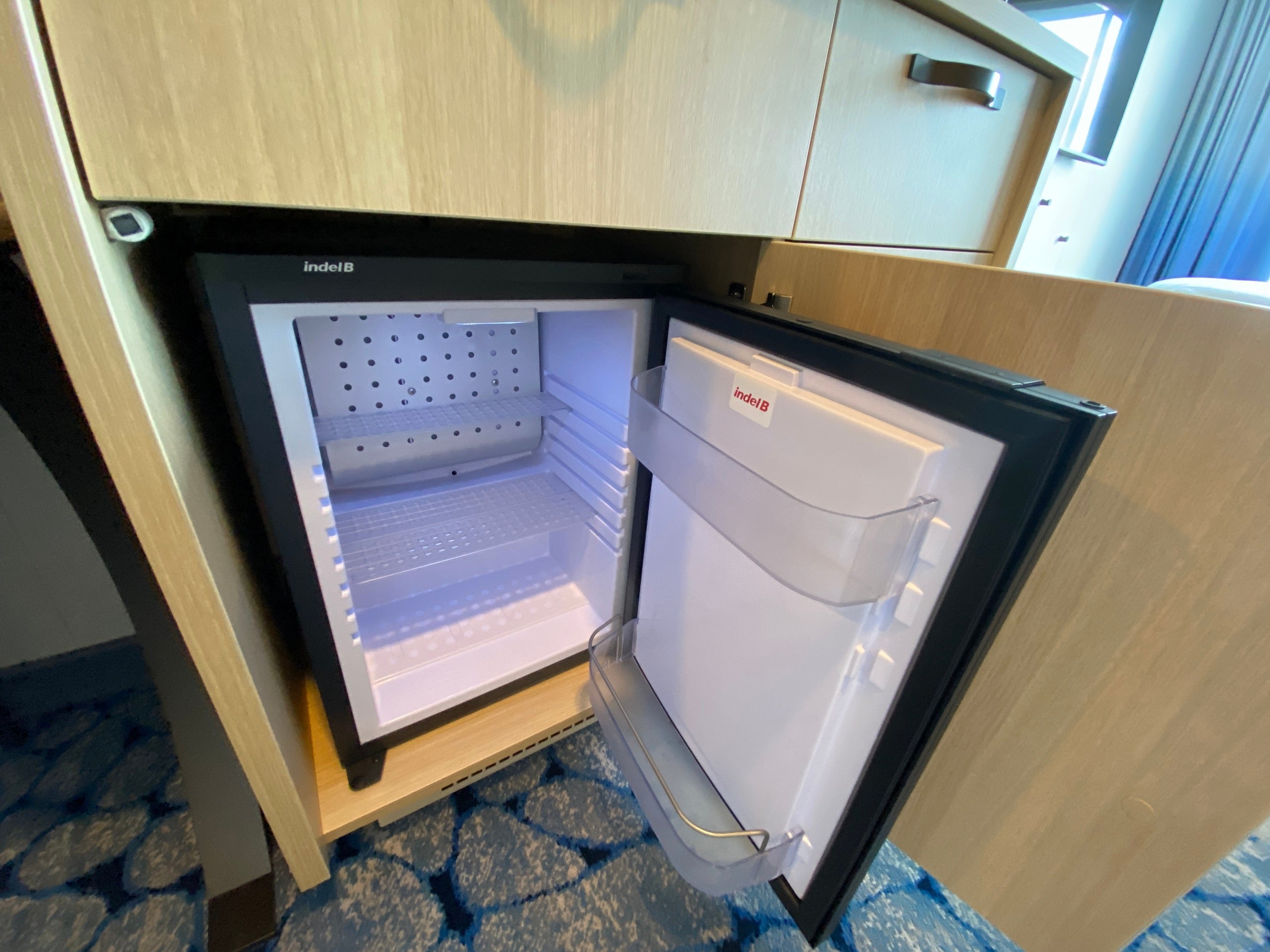 Mini-fridge in a balcony cabin on Royal Caribbean's Wonder of the Seas.