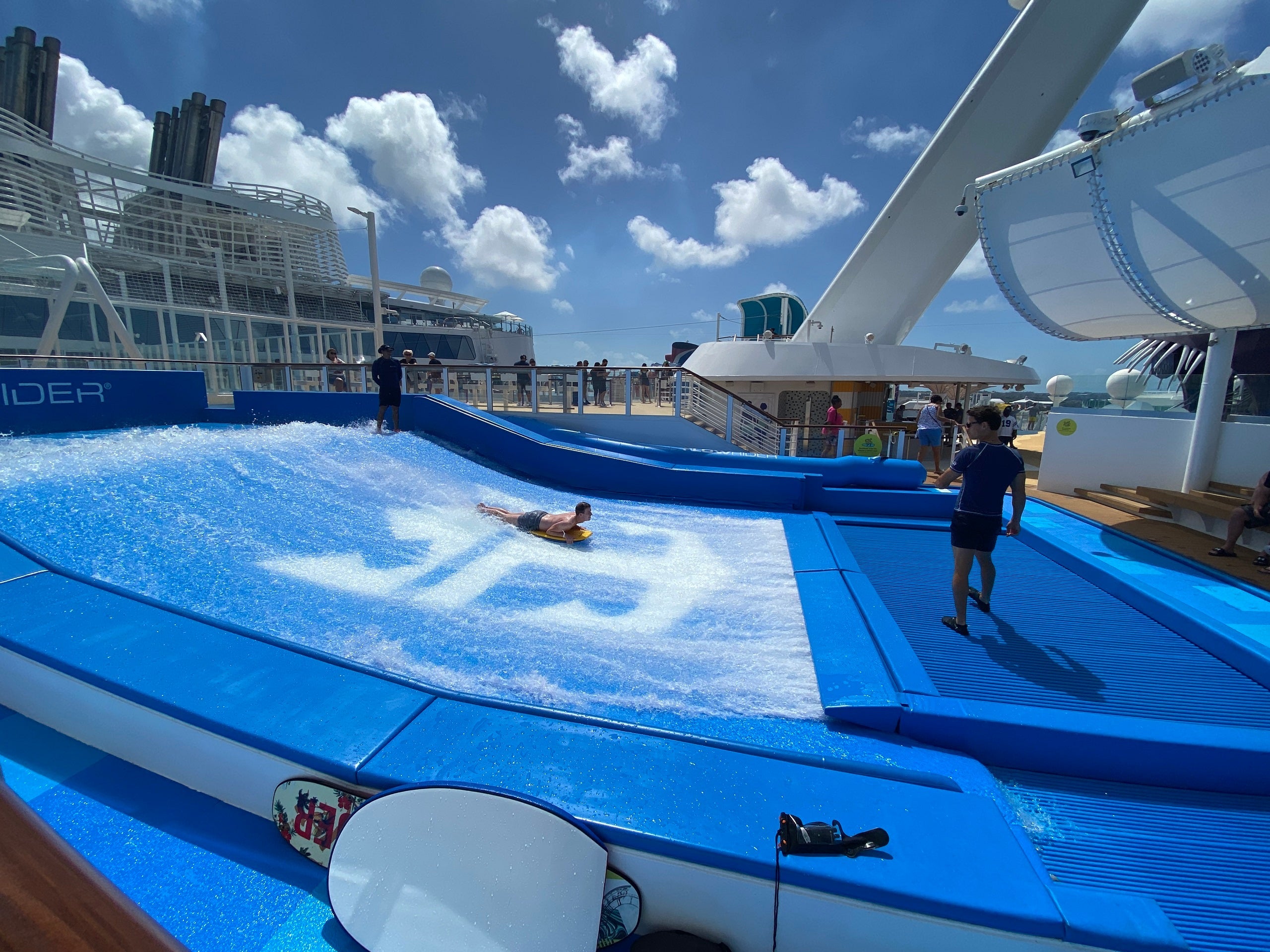 A passenger boogie boarding on the FlowRider on Royal Caribbean's Wonder of the Seas.