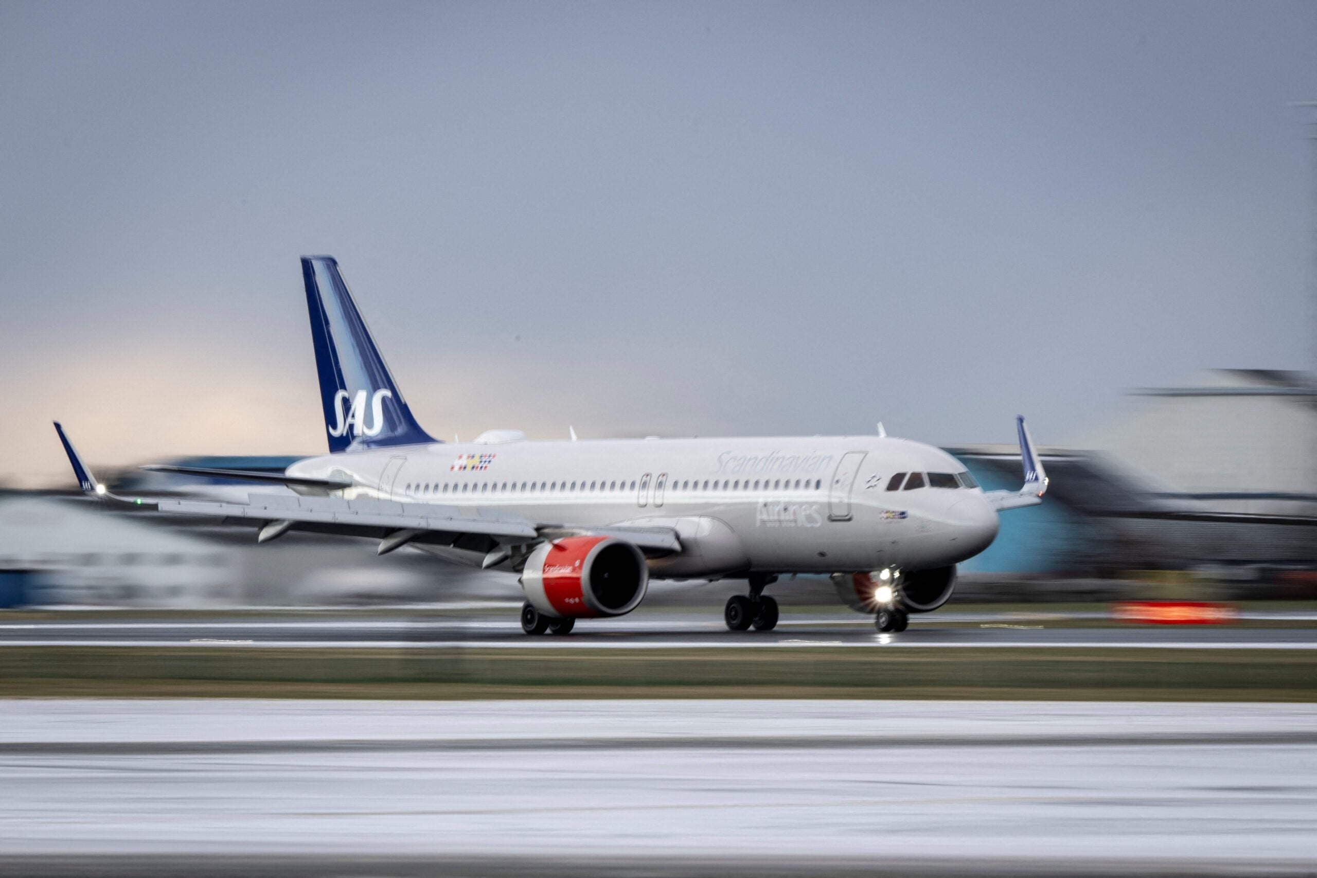 Aircraft of Scandinavian Airlines SAS lands at Copenhagen Airport (CPH)