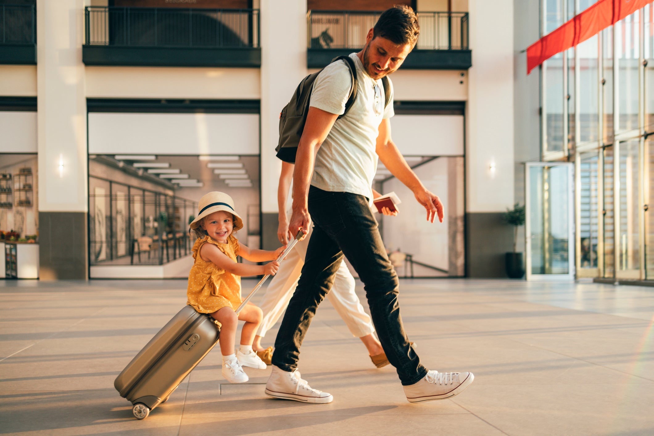 Dad and daughter walked at the airport