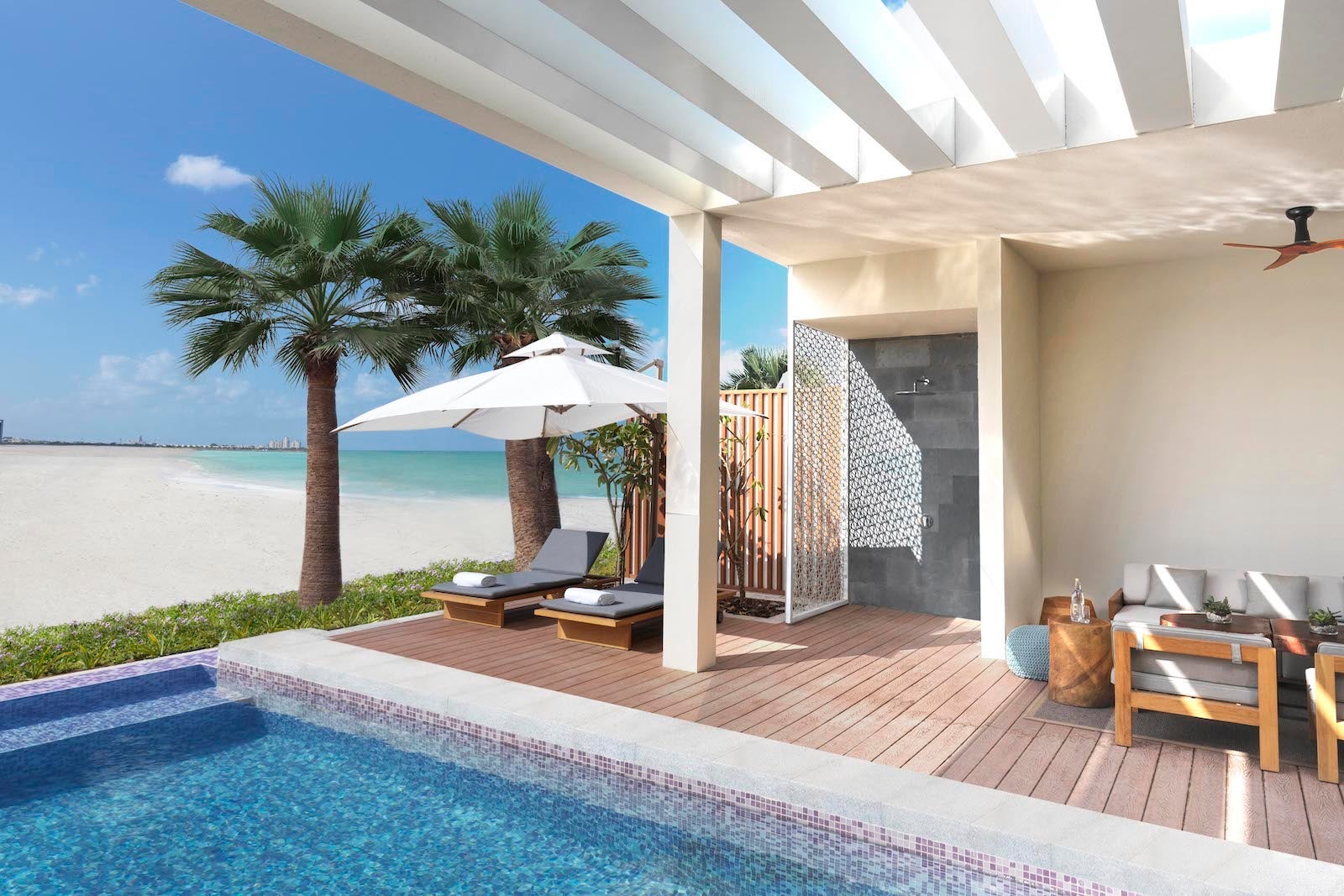 hotel deck with private pool by beach