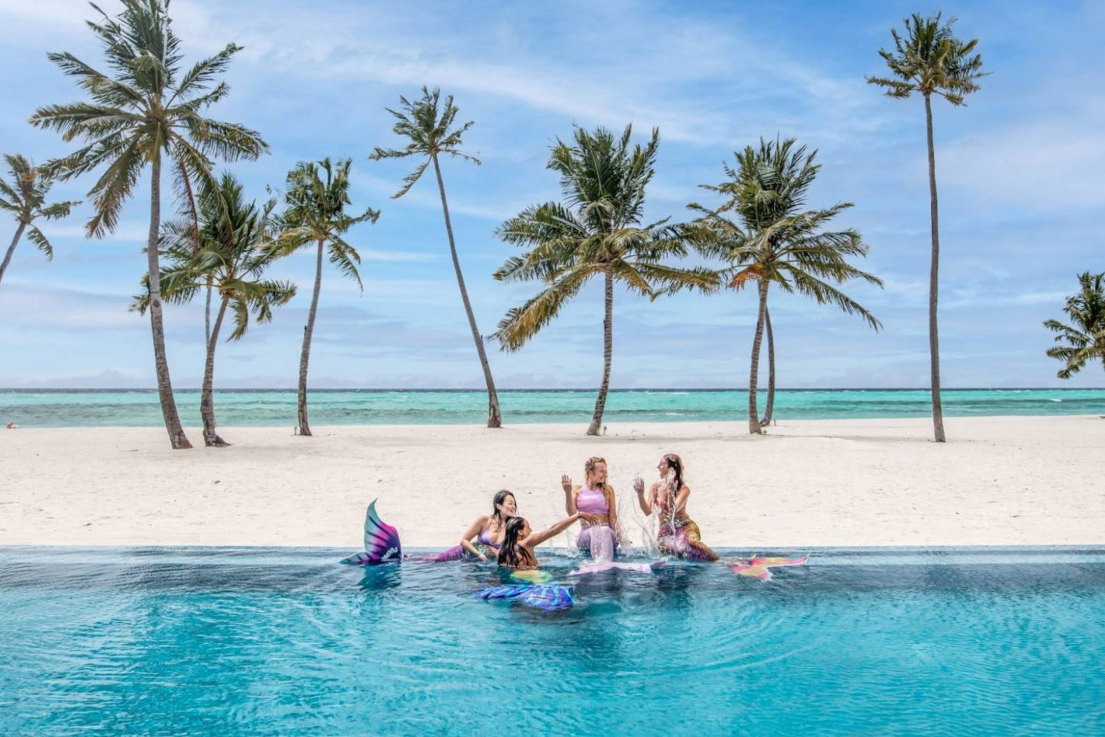 Mermaids on the water's edge